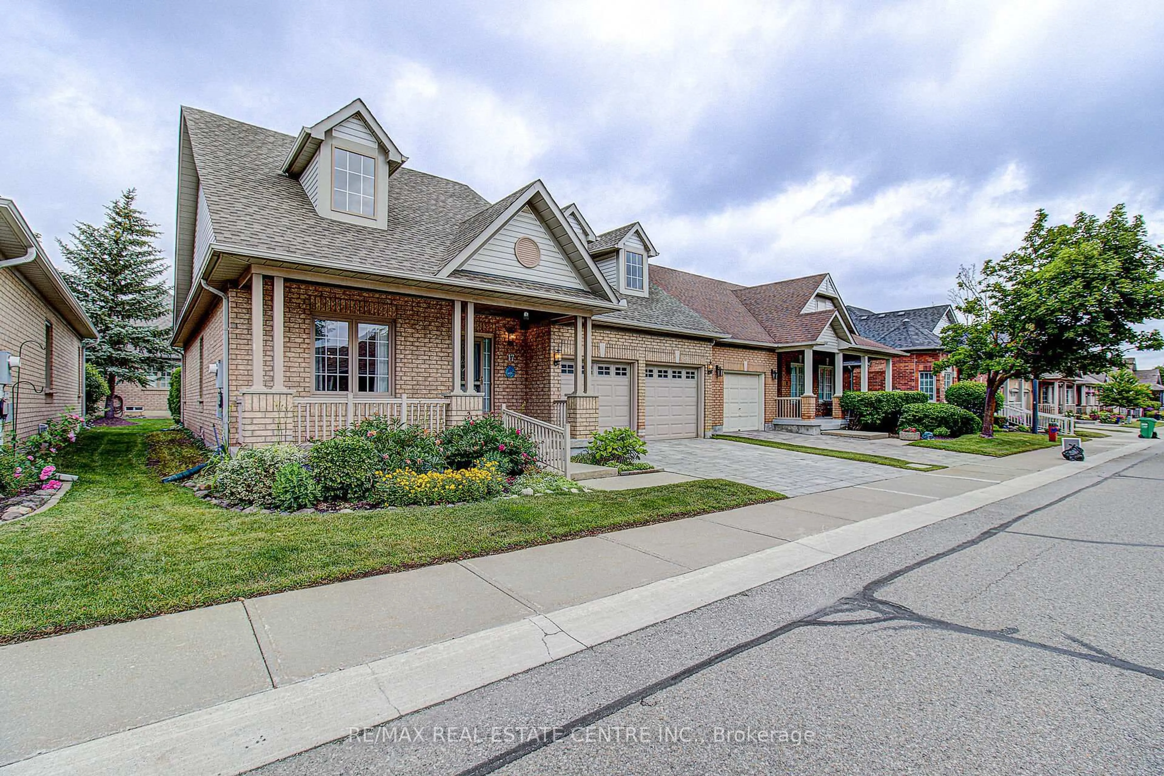 Home with brick exterior material, street for 17 Golf Links Dr, Brampton Ontario L6R 1W5