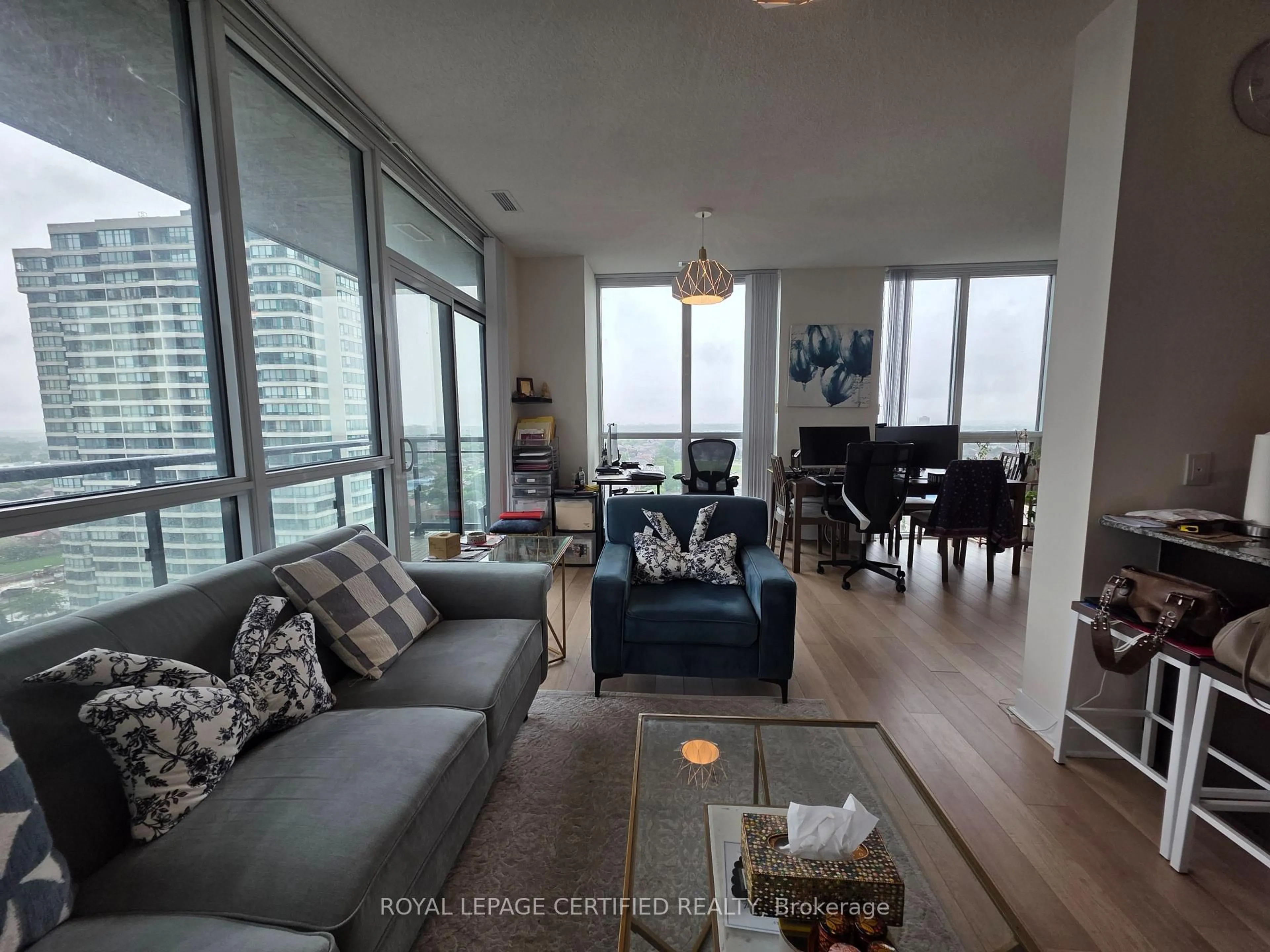 Living room with furniture, unknown for 3975 Grand Park Dr #1302, Mississauga Ontario L5B 4M6
