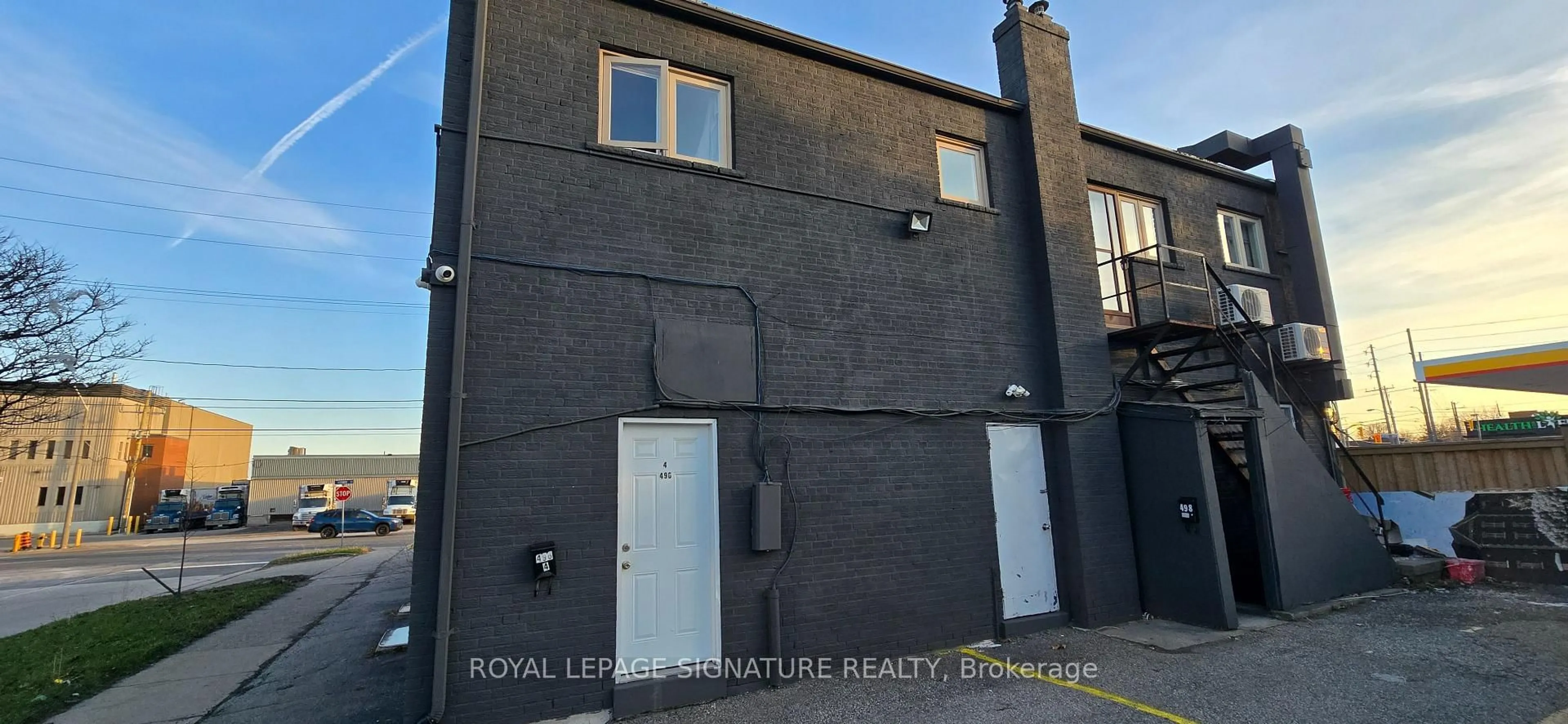 A pic from outside/outdoor area/front of a property/back of a property/a pic from drone, street for 496-498 Horner Ave, Toronto Ontario M8W 2B8