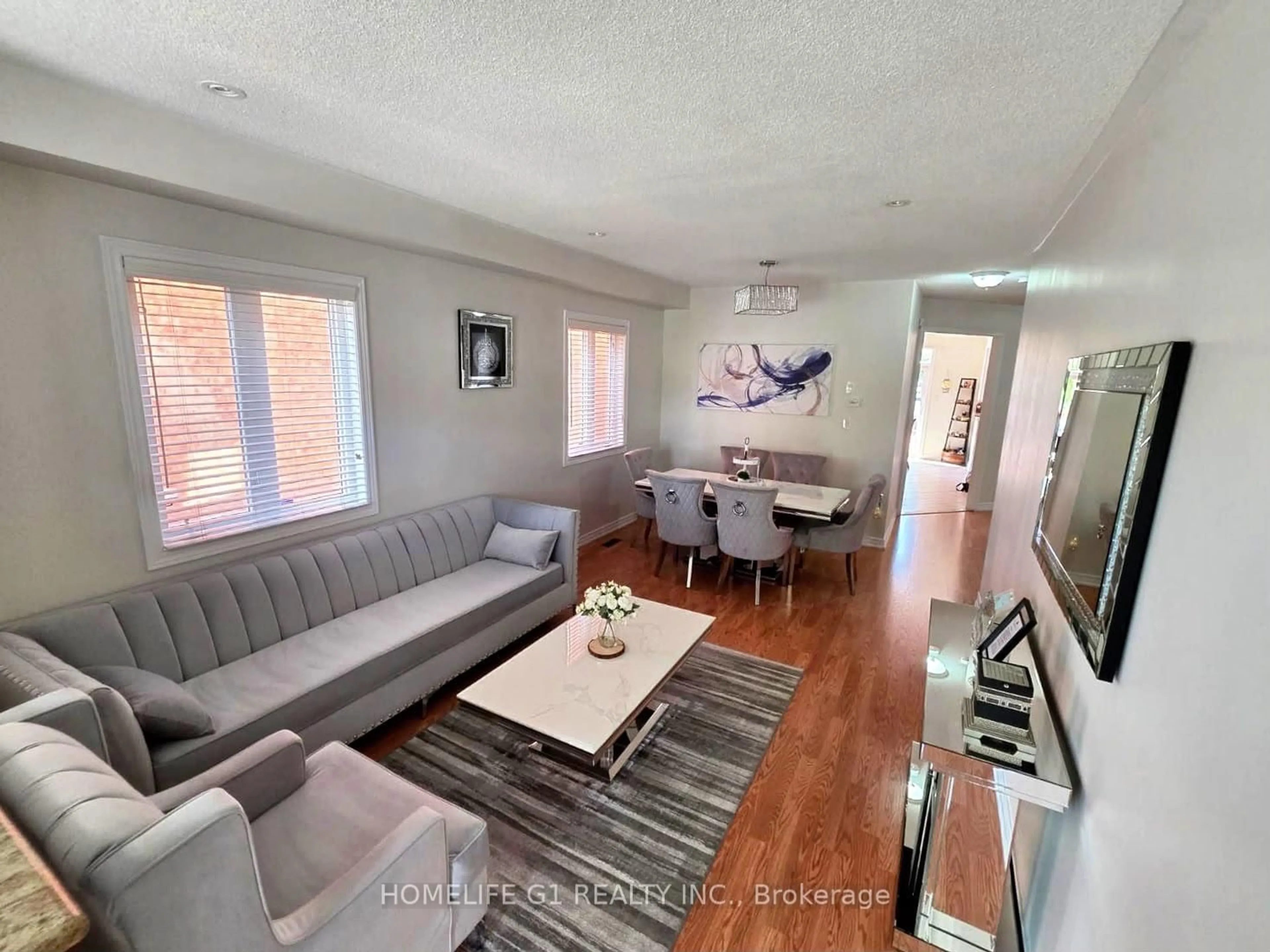 Living room with furniture, unknown for 62 Dewside Dr, Brampton Ontario L6R 0X5