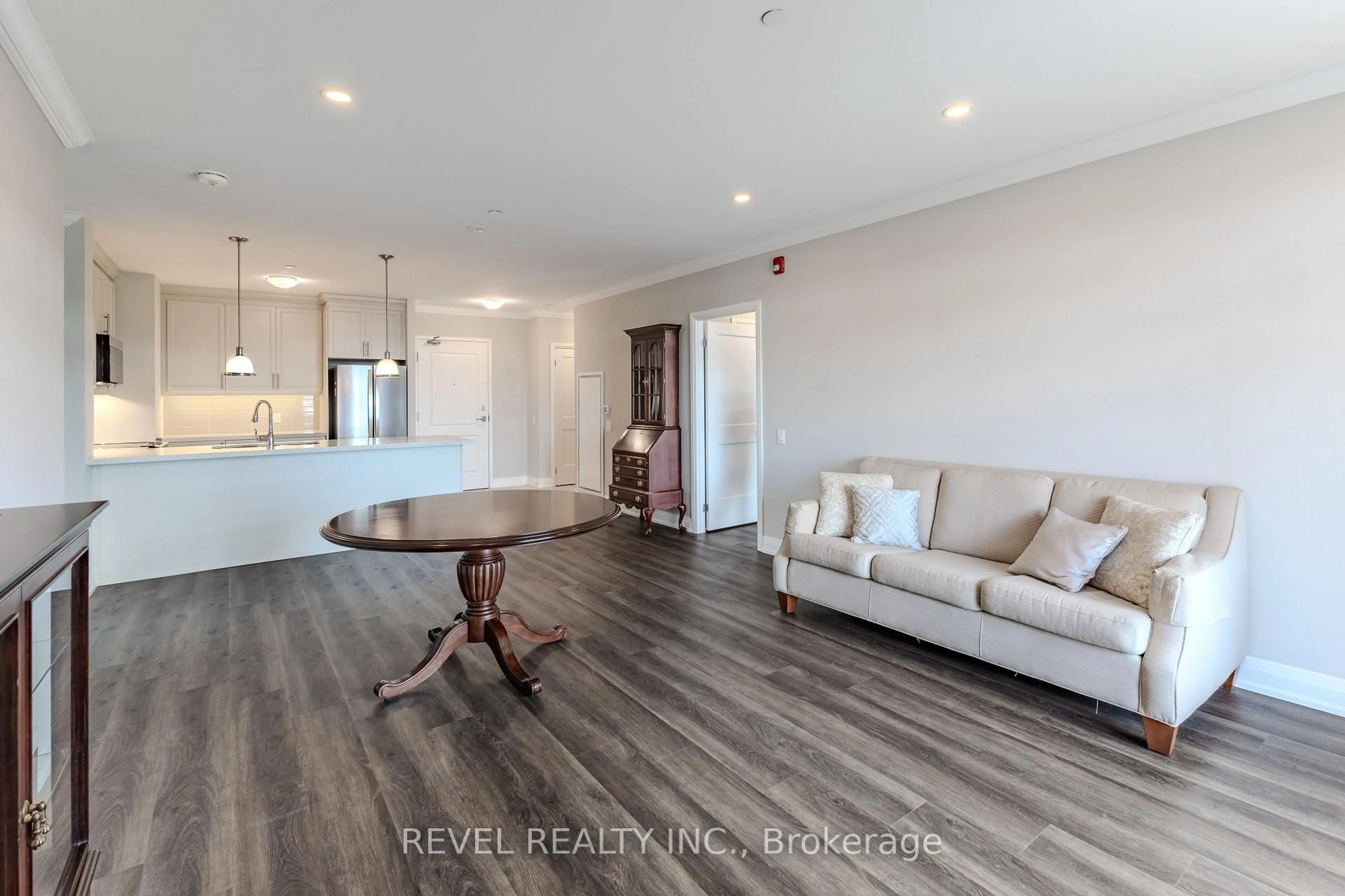 Open concept kitchen, wood/laminate floor for 830 Megson Terr #605, Milton Ontario L9T 9M7