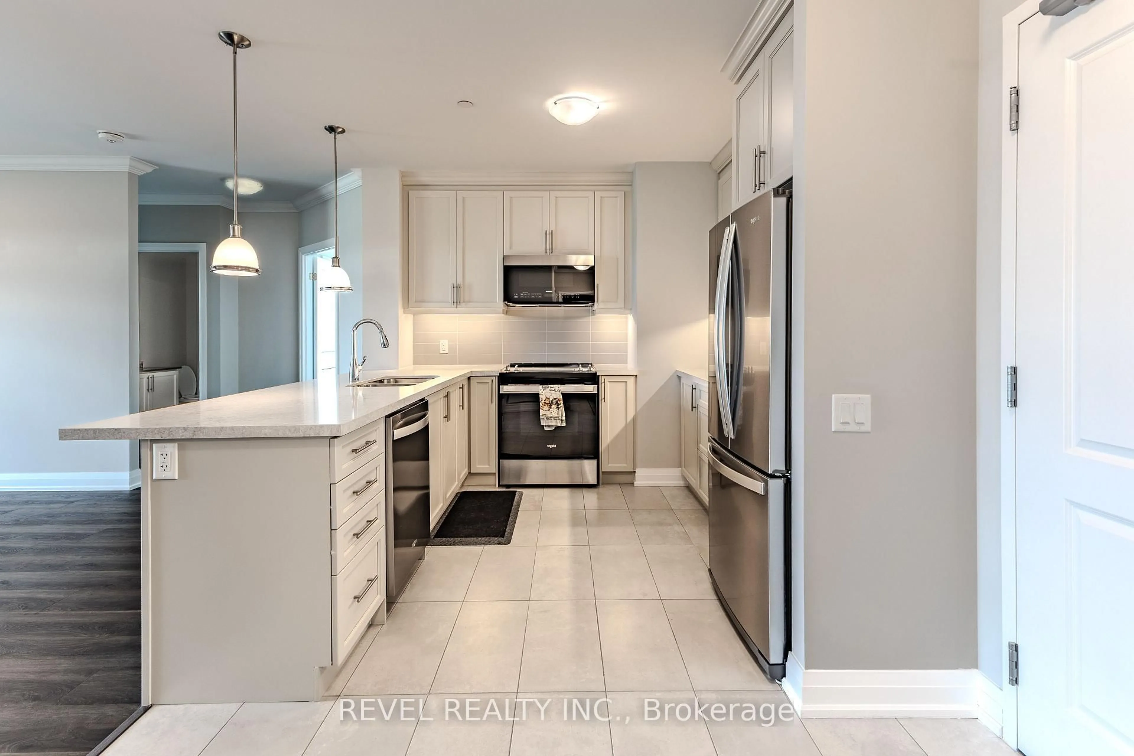 Open concept kitchen, ceramic/tile floor for 830 Megson Terr #605, Milton Ontario L9T 9M7