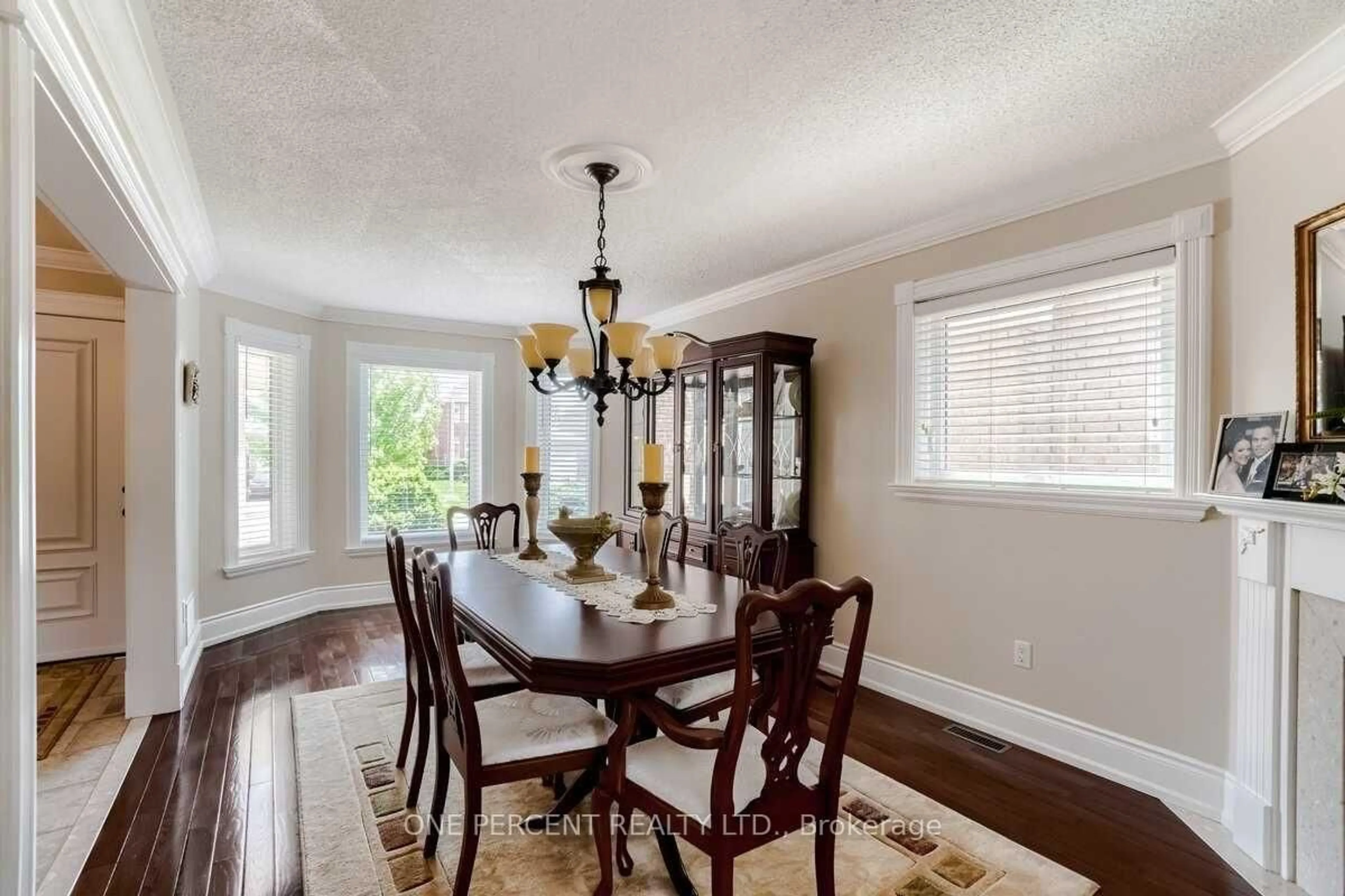 Dining room, wood/laminate floor for 15 Beaverhall Rd, Brampton Ontario L6X 4L3