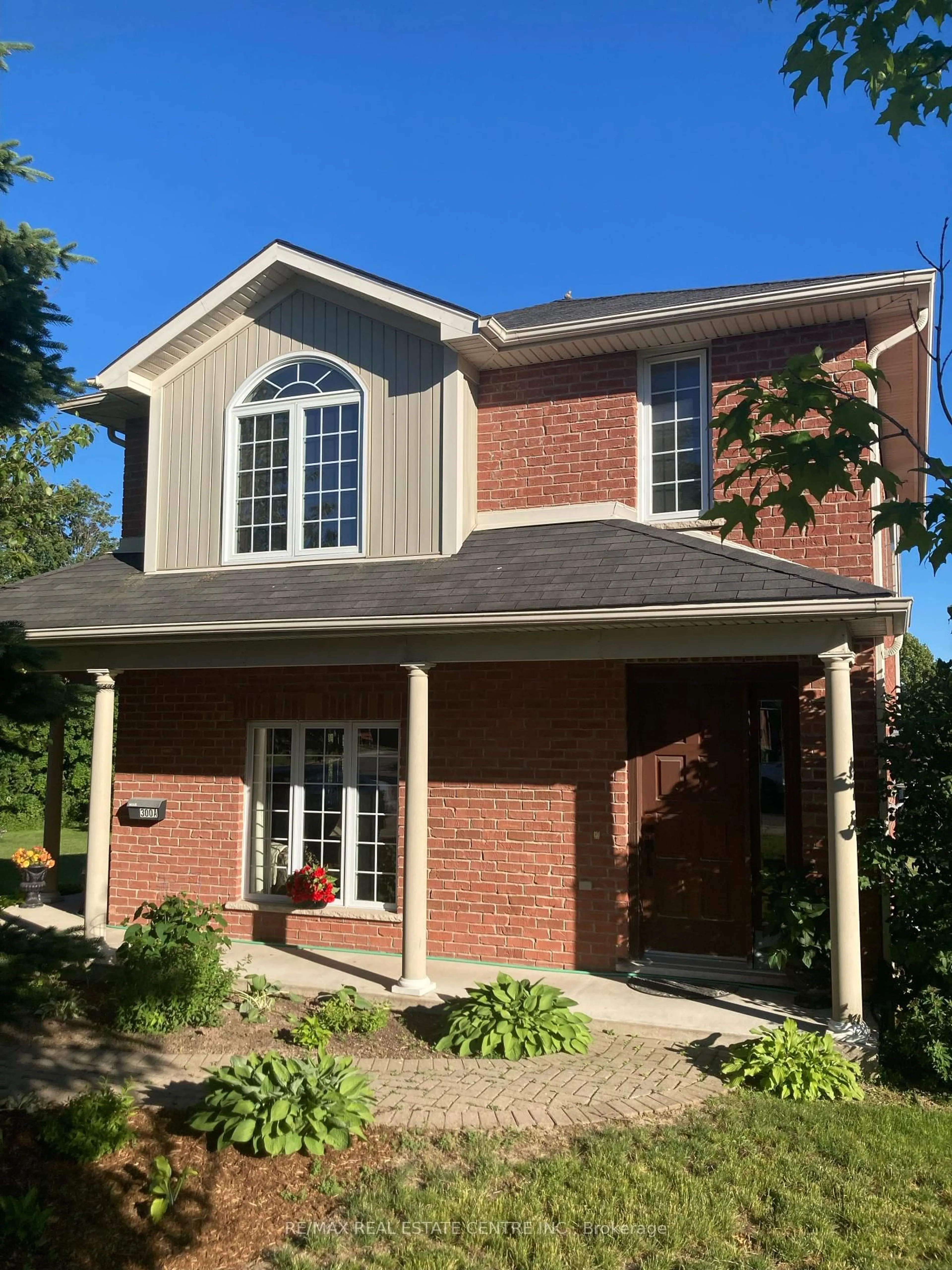 Home with brick exterior material, street for 300 A Broadway, Orangeville Ontario L9W 1L3
