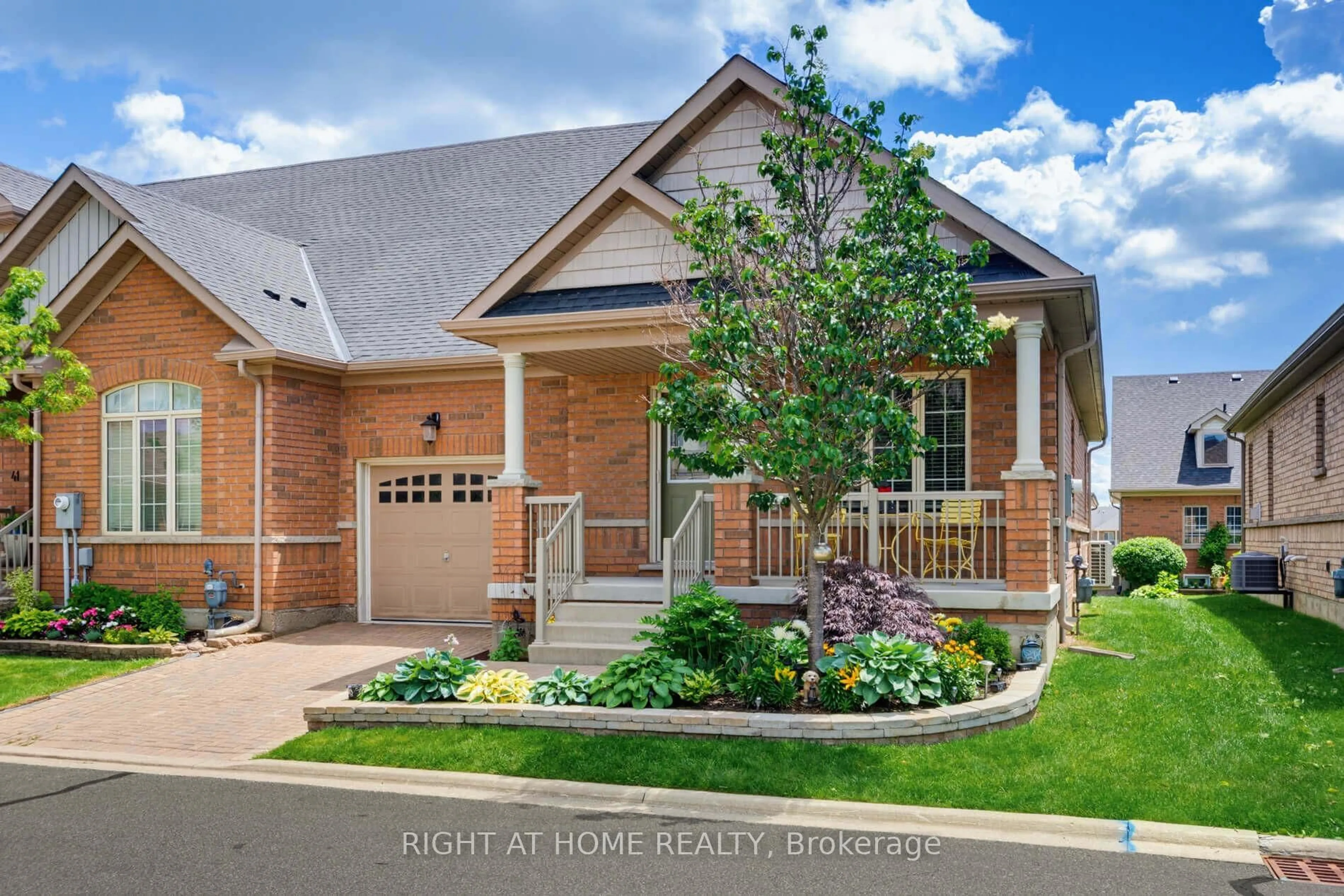 Home with brick exterior material, street for 39 Lacorra Way, Brampton Ontario L6R 3P2