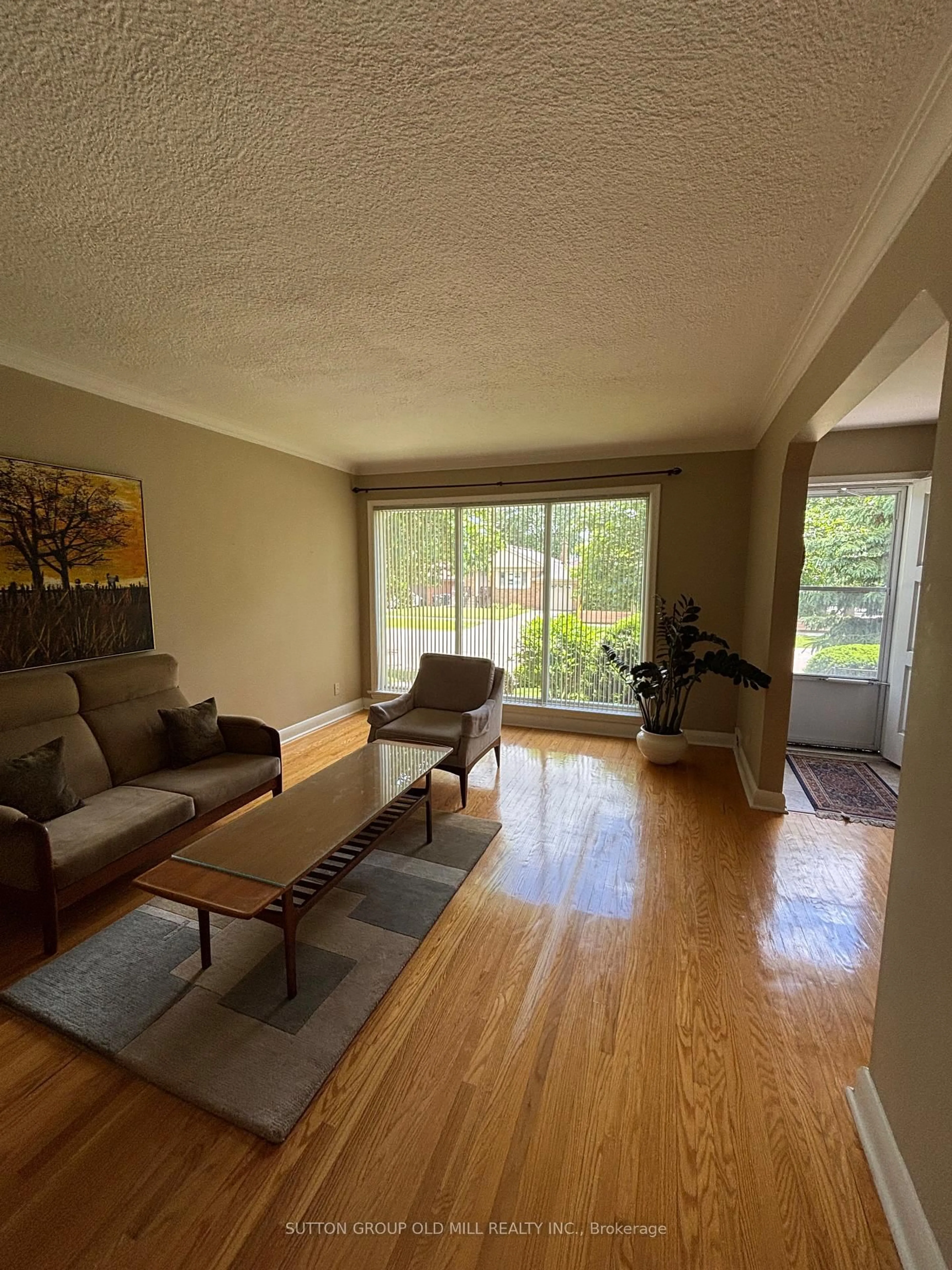 Living room with furniture, wood/laminate floor for 14 Claymore Dr, Toronto Ontario M8Z 2R9