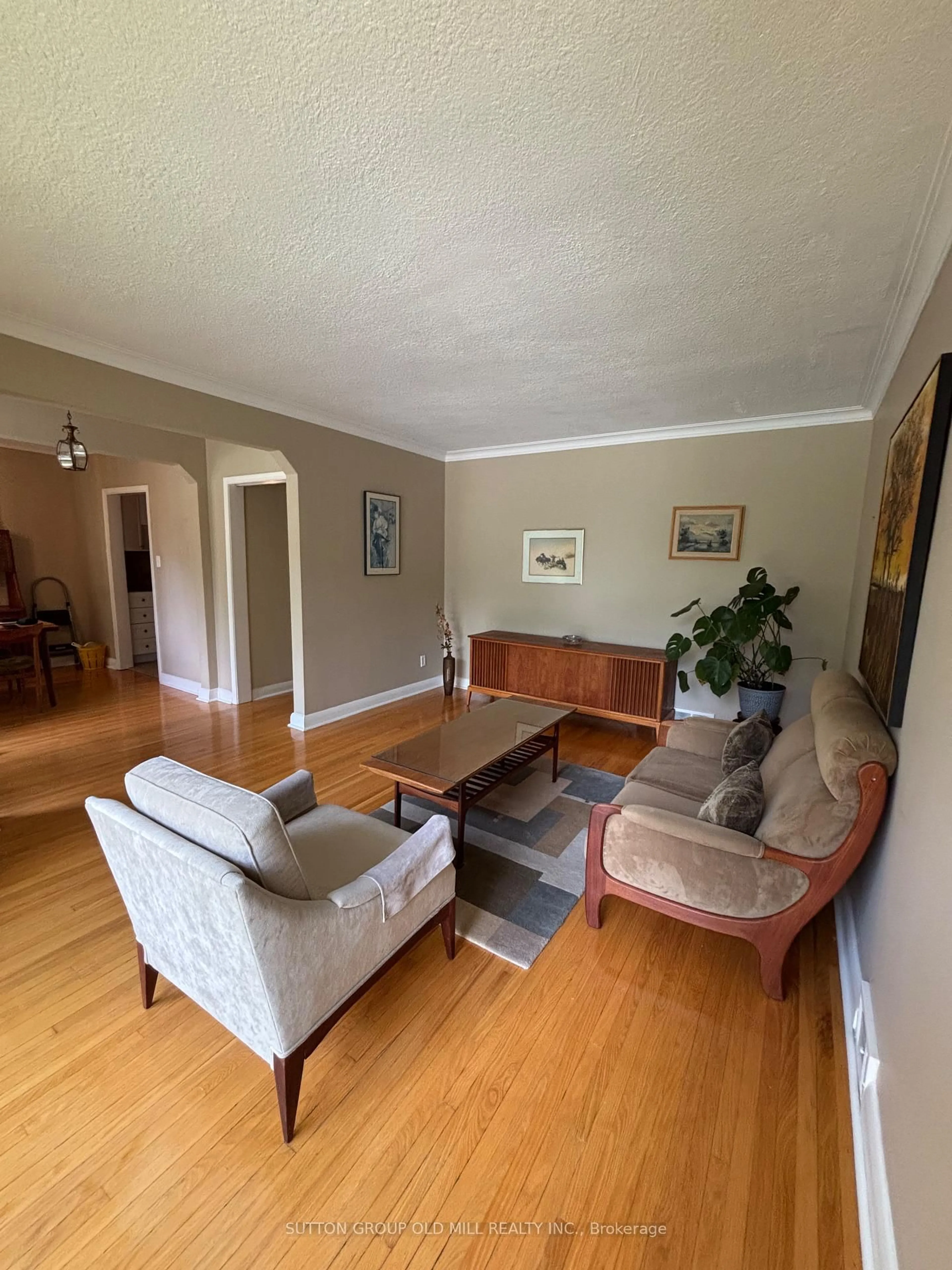 Living room with furniture, wood/laminate floor for 14 Claymore Dr, Toronto Ontario M8Z 2R9