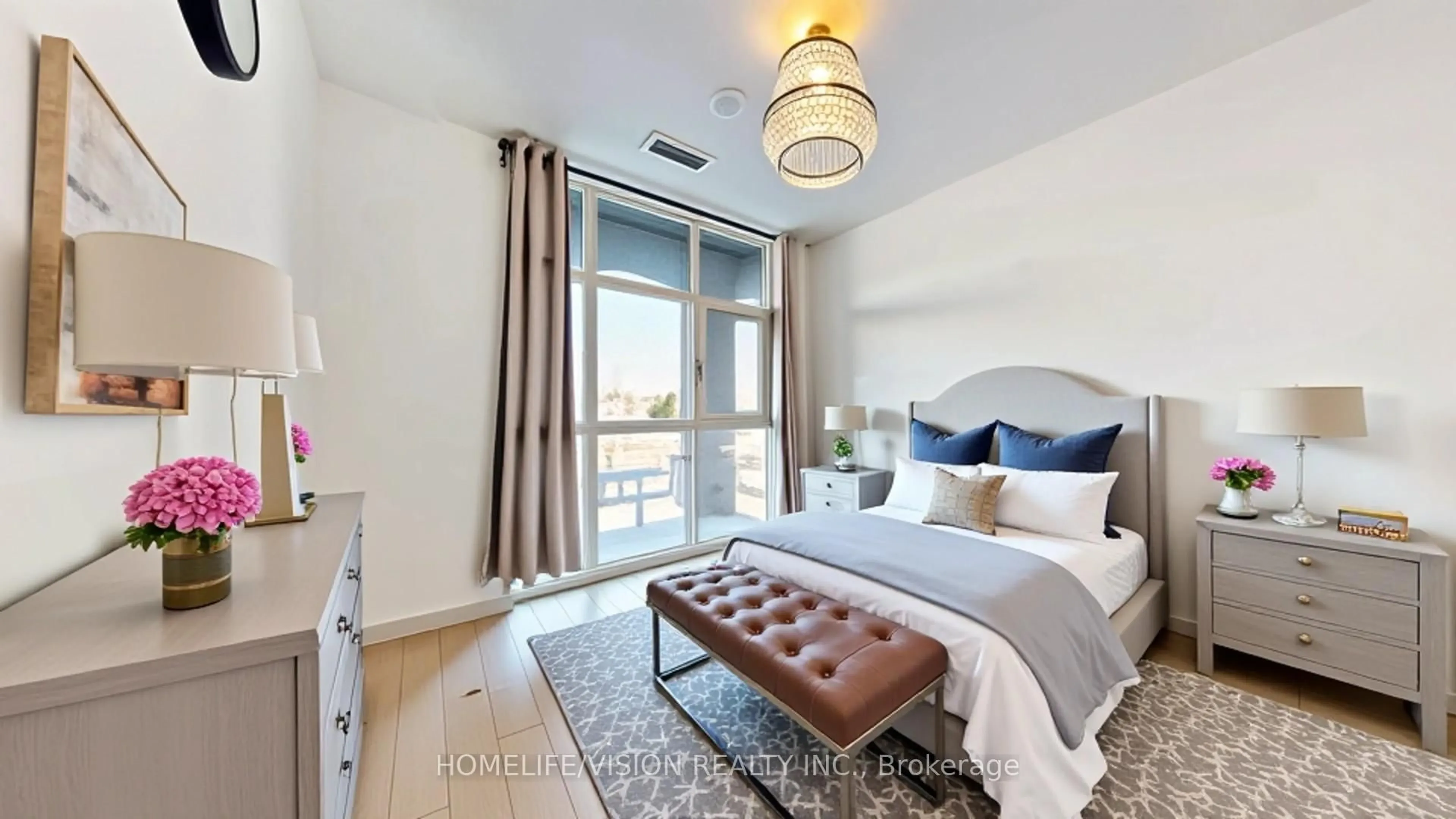 Bedroom with bed, wood/laminate floor for 60 George Butchart Dr #219, Toronto Ontario M3K 0E1