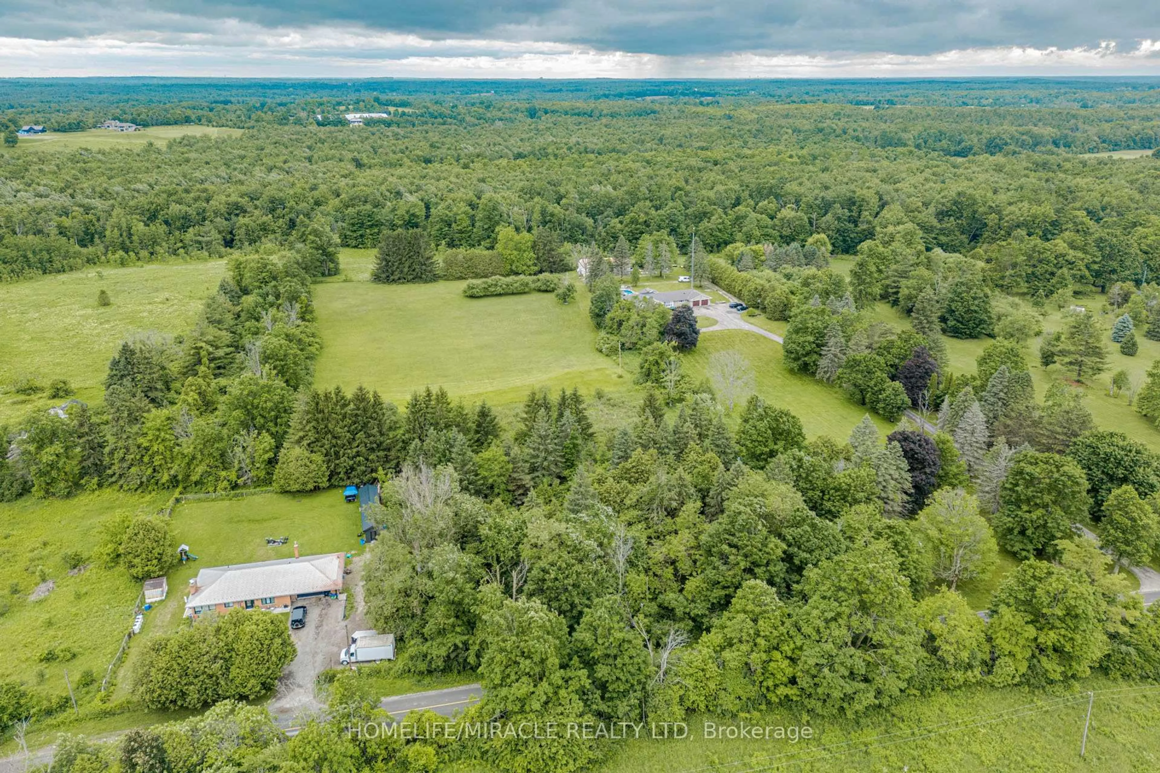 A pic from outside/outdoor area/front of a property/back of a property/a pic from drone, forest/trees view for 11948 Dublin Line, Halton Hills Ontario L7J 2M1