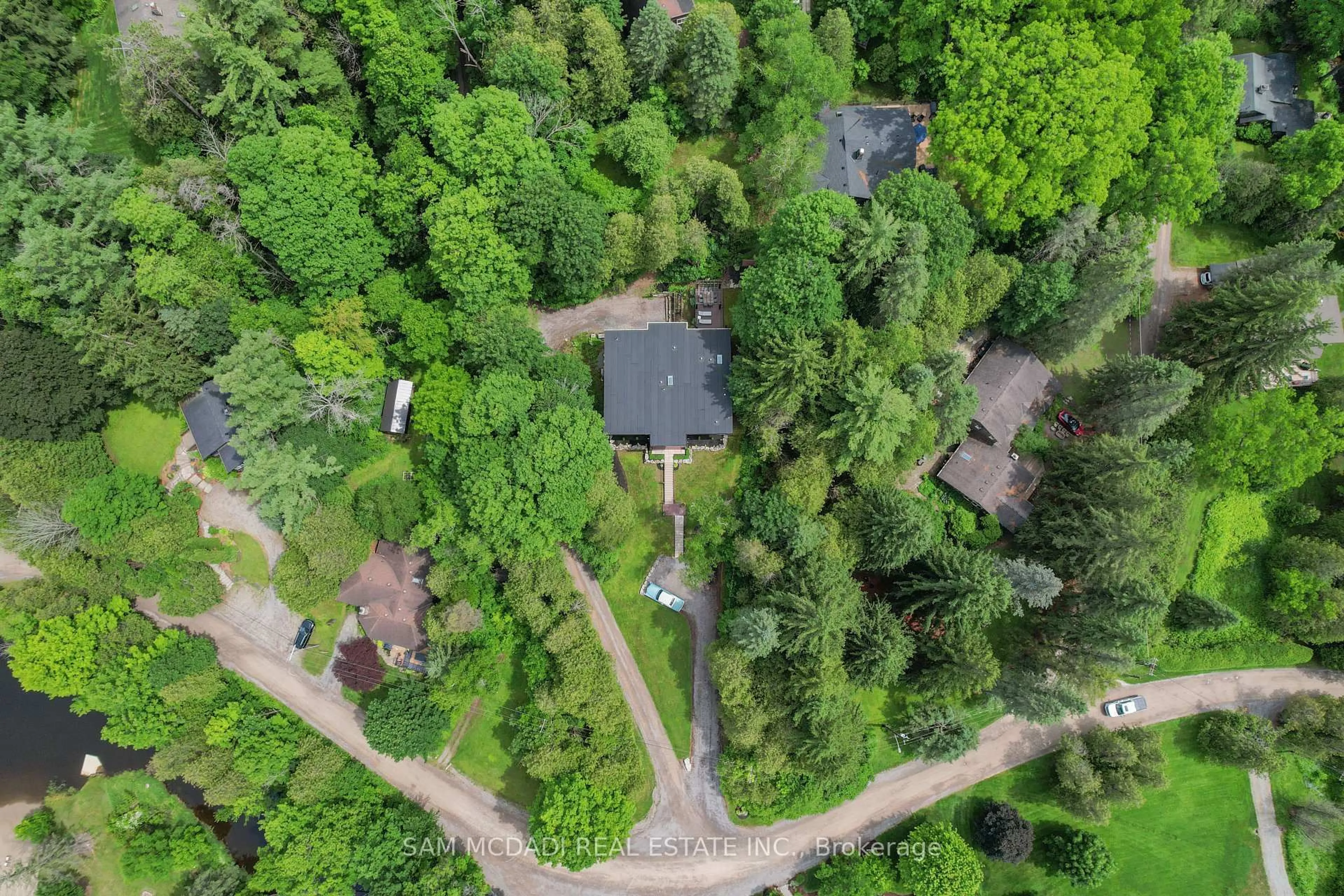 A pic from outside/outdoor area/front of a property/back of a property/a pic from drone, forest/trees view for 2084 Grand Blvd, Burlington Ontario L7P 0N1