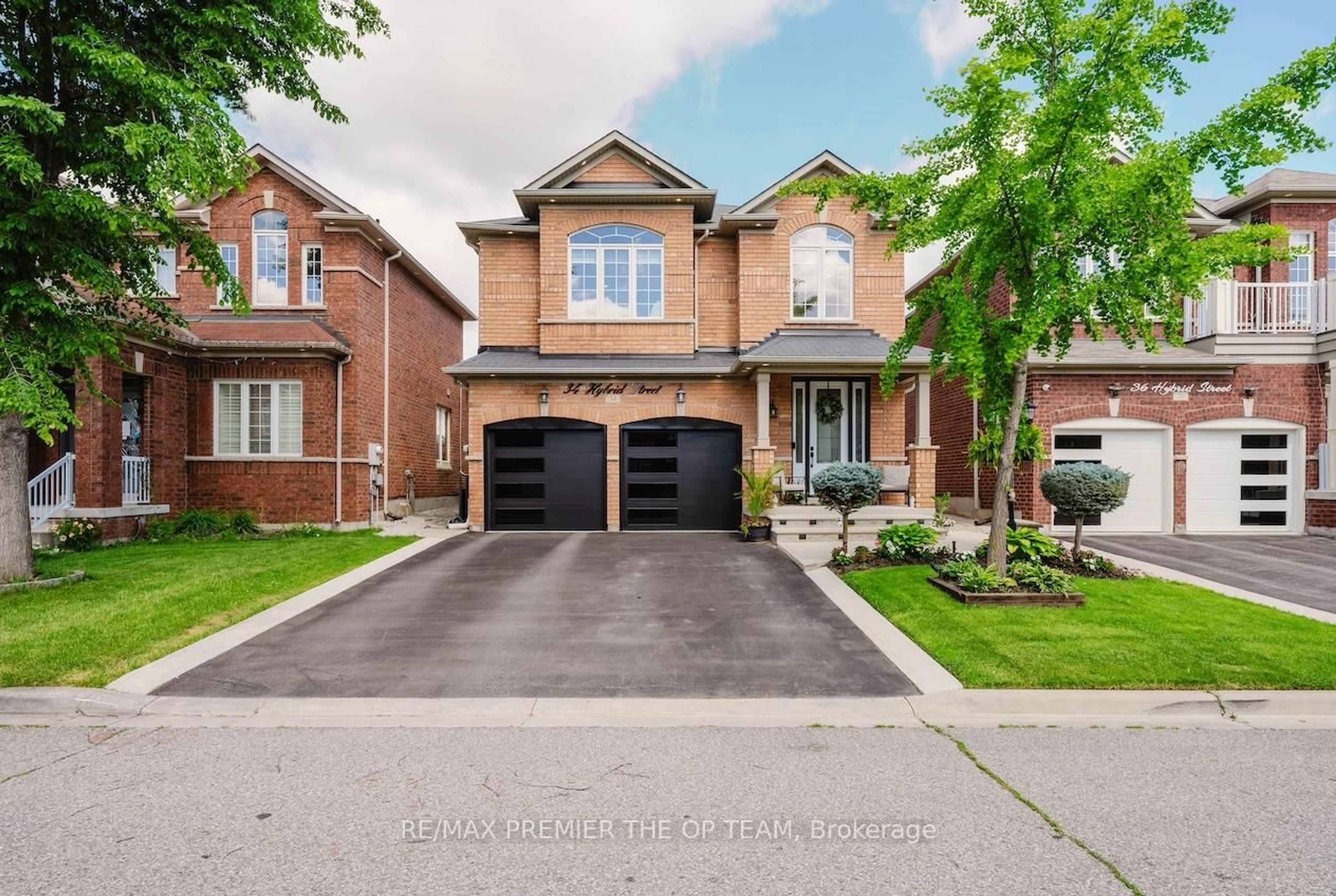 Home with brick exterior material, street for 34 Hybrid St, Brampton Ontario L7A 0N2