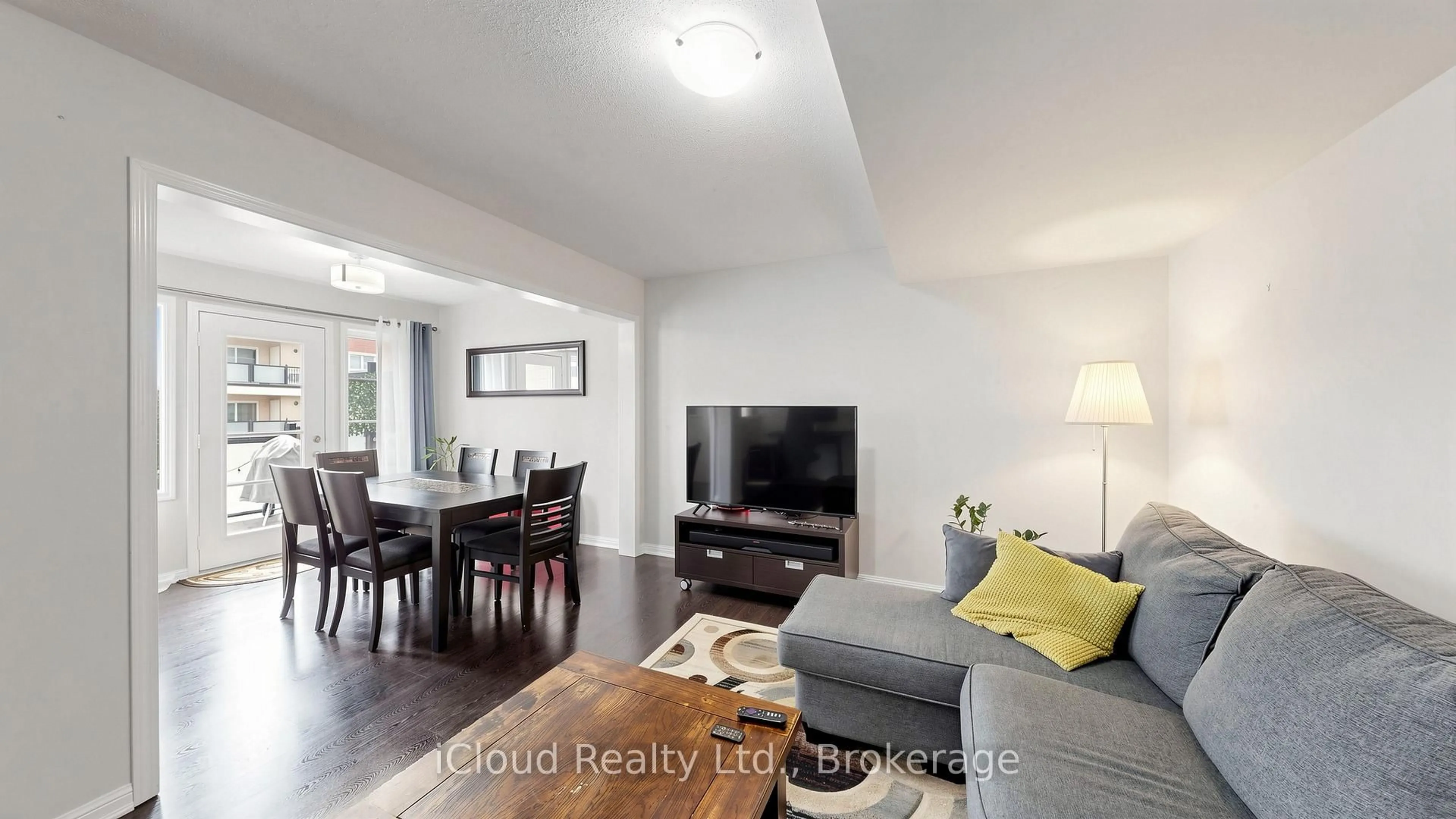 Living room with furniture, wood/laminate floor for 118 Baycliffe Cres, Brampton Ontario L7A 3Z4