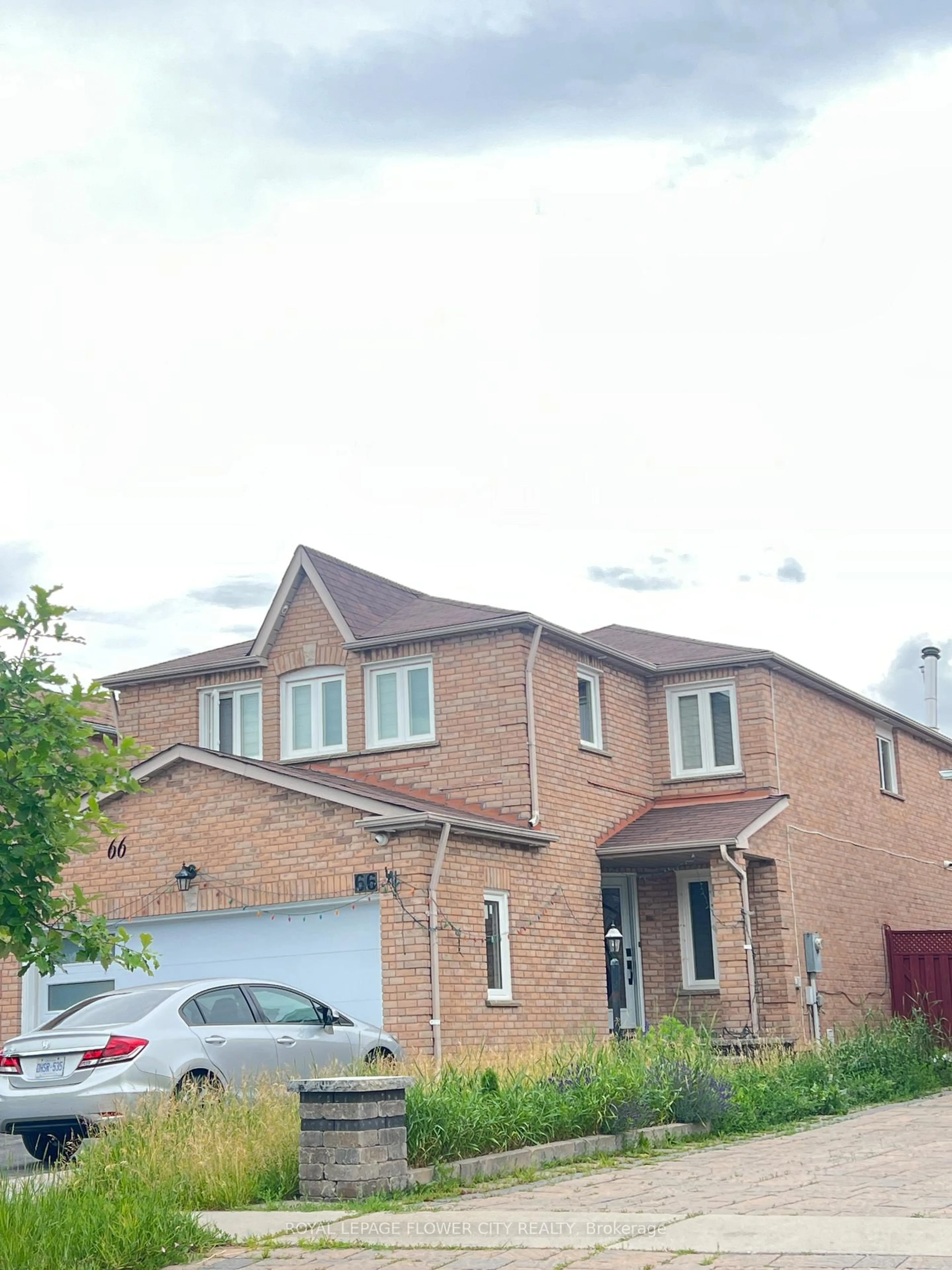 Home with brick exterior material, street for 66 FAYWOOD Dr, Brampton Ontario L6Y 4L9