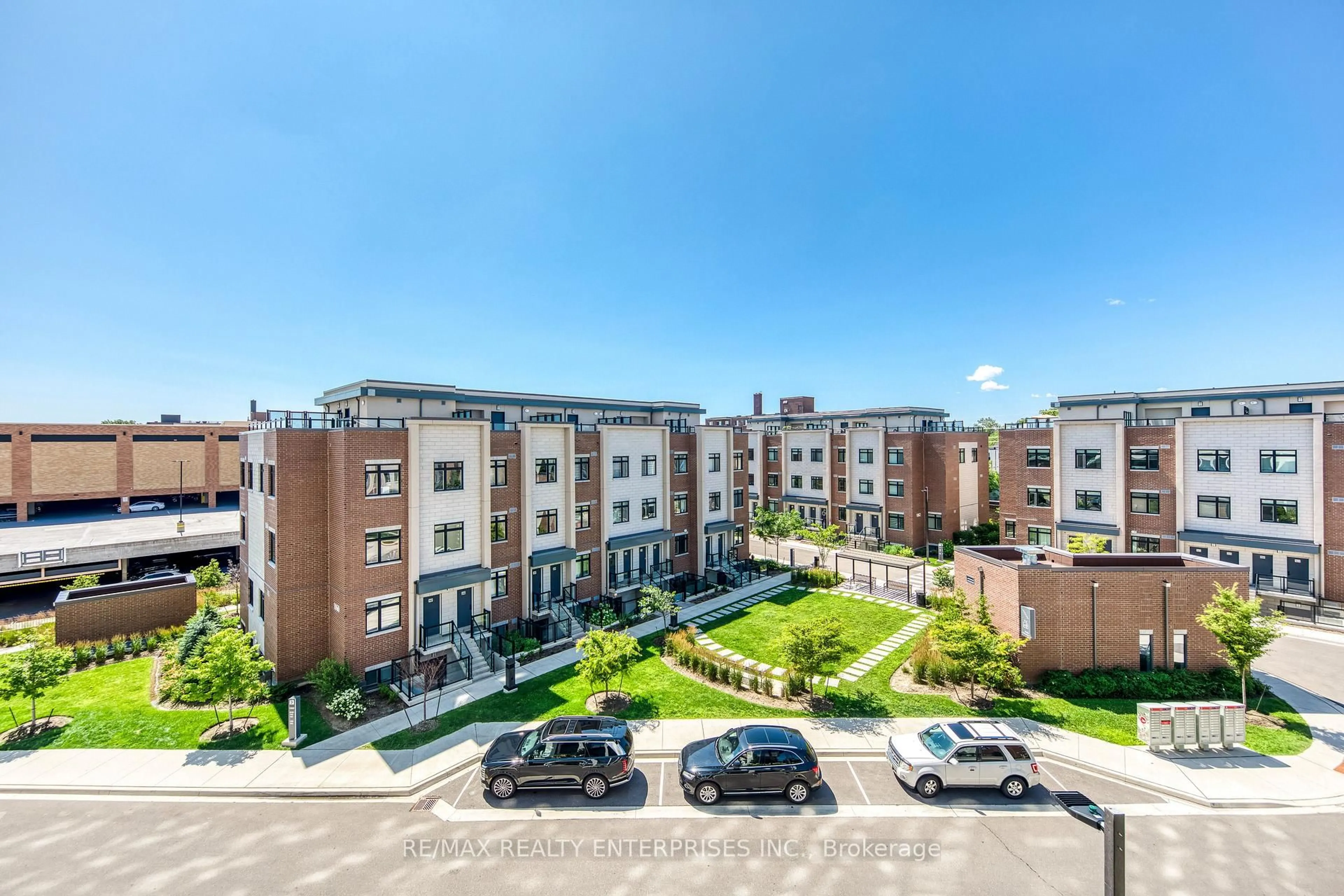 A pic from outside/outdoor area/front of a property/back of a property/a pic from drone, unknown for 1063 Douglas McCurdy Common #312, Mississauga Ontario L5G 0C5