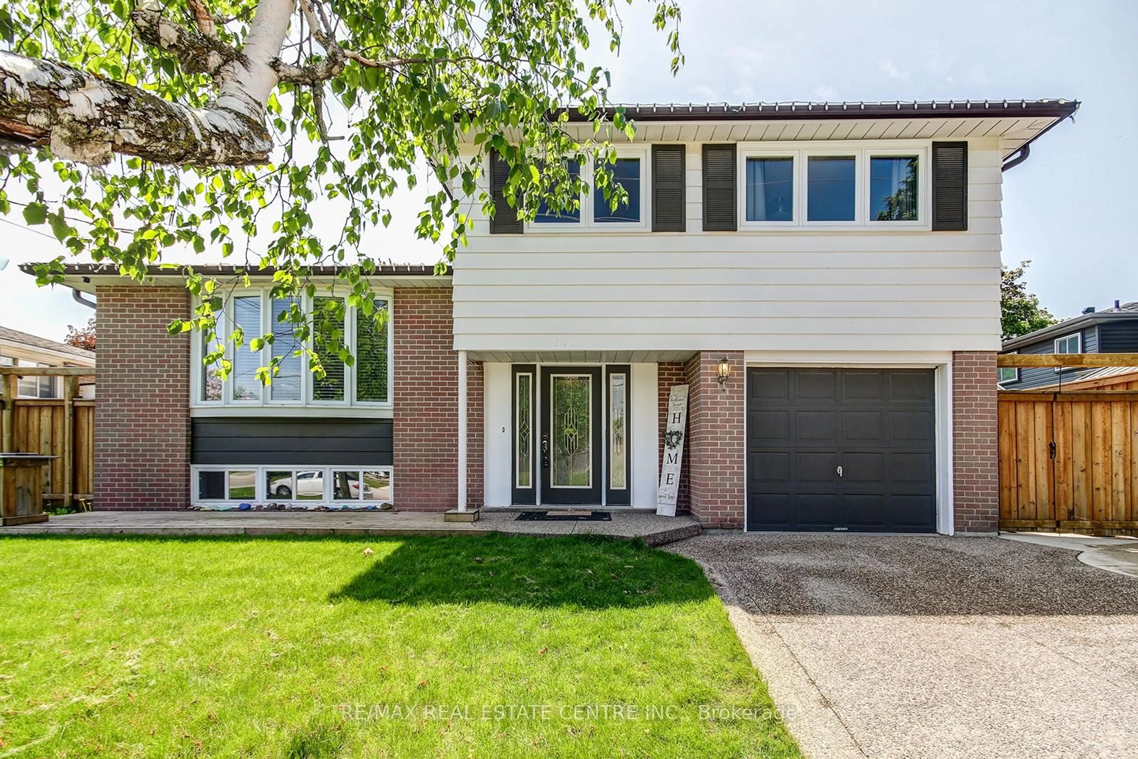 Home with brick exterior material, street for 200 DELREX Blvd, Halton Hills Ontario L7G 4E7