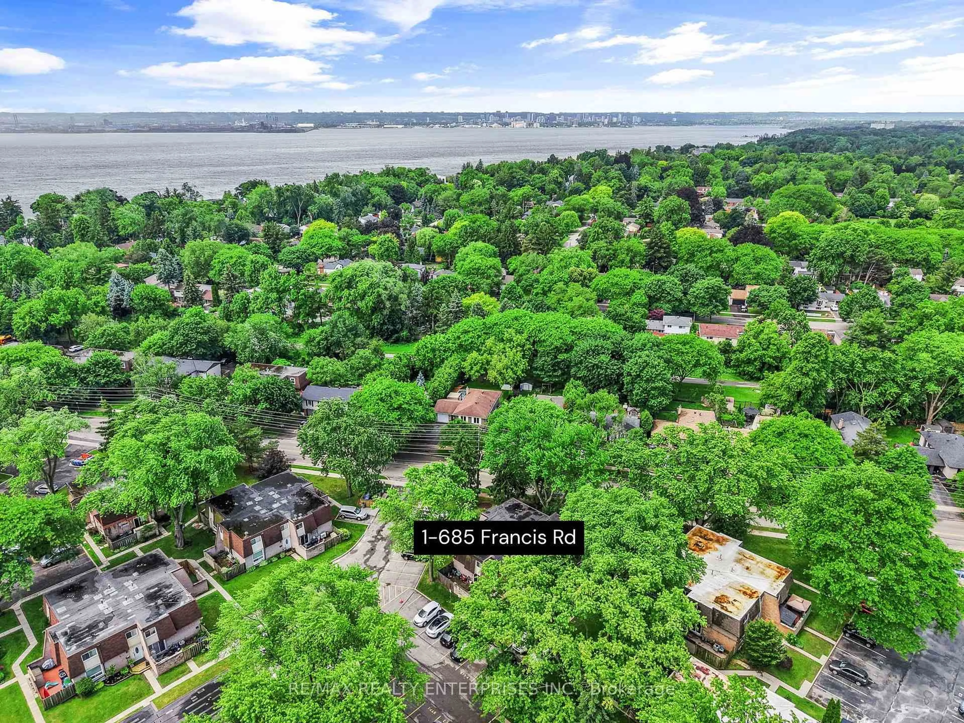 A pic from outside/outdoor area/front of a property/back of a property/a pic from drone, water/lake/river/ocean view for 685 Francis Rd #1, Burlington Ontario L7T 3X6