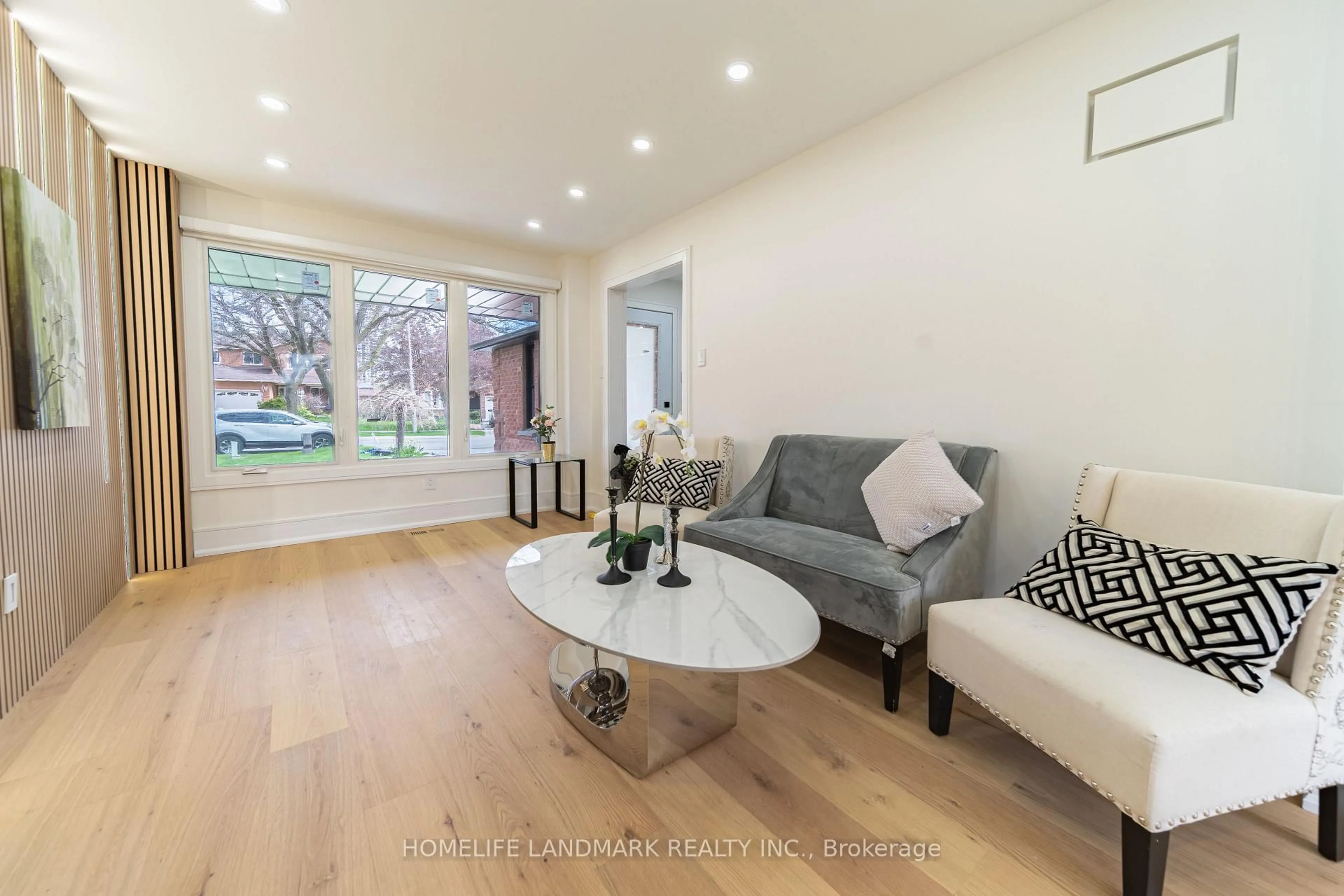 Living room with furniture, wood/laminate floor for 224 Macedonia Cres, Mississauga Ontario L5B 3R8