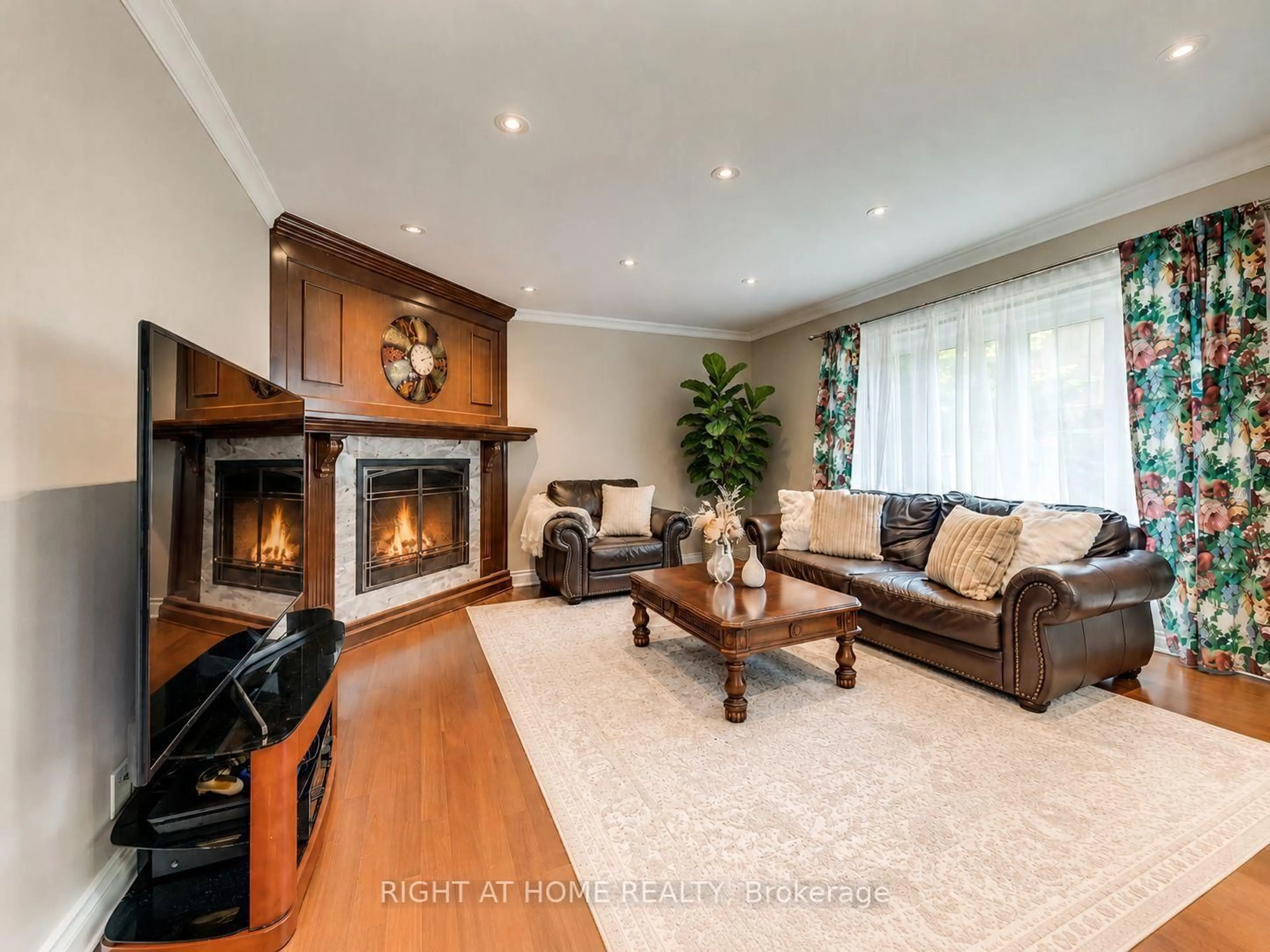 Living room with furniture, wood/laminate floor for 1311 Playter Pl, Oakville Ontario L6M 2V1