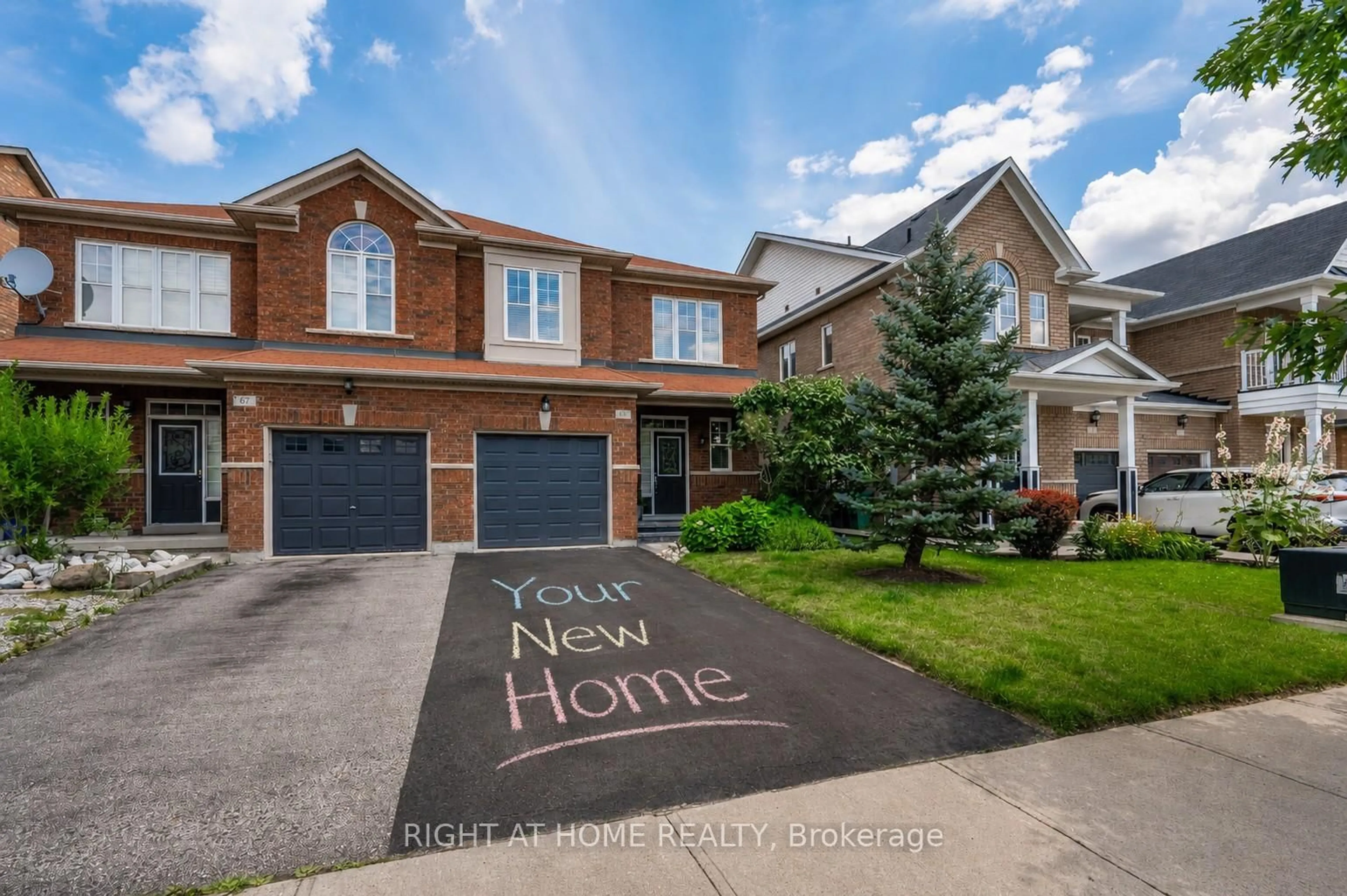 Home with brick exterior material, street for 65 Iceland Poppy Tr, Brampton Ontario L7A 0N1
