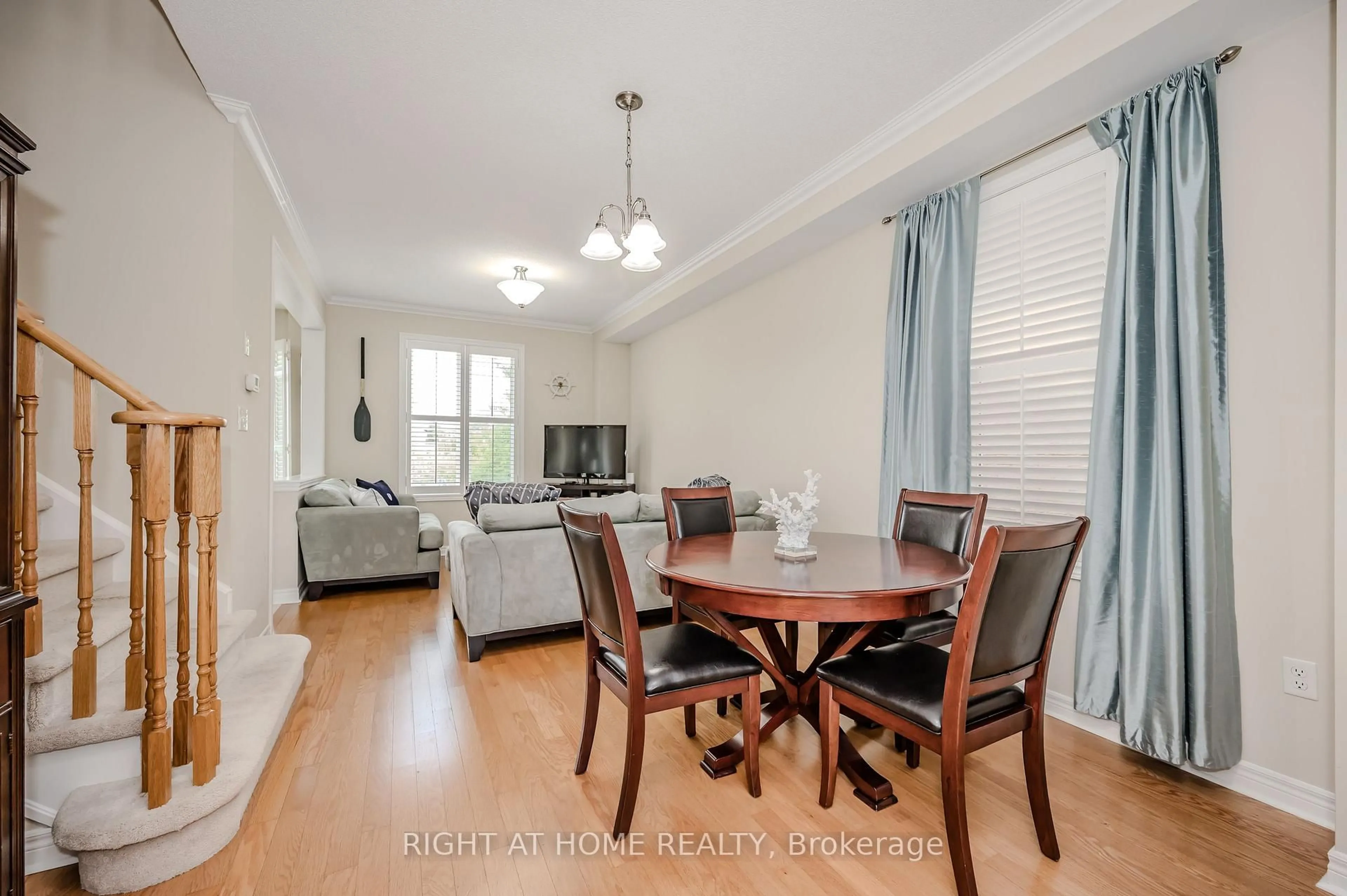 Dining room, wood/laminate floor for 65 Iceland Poppy Tr, Brampton Ontario L7A 0N1