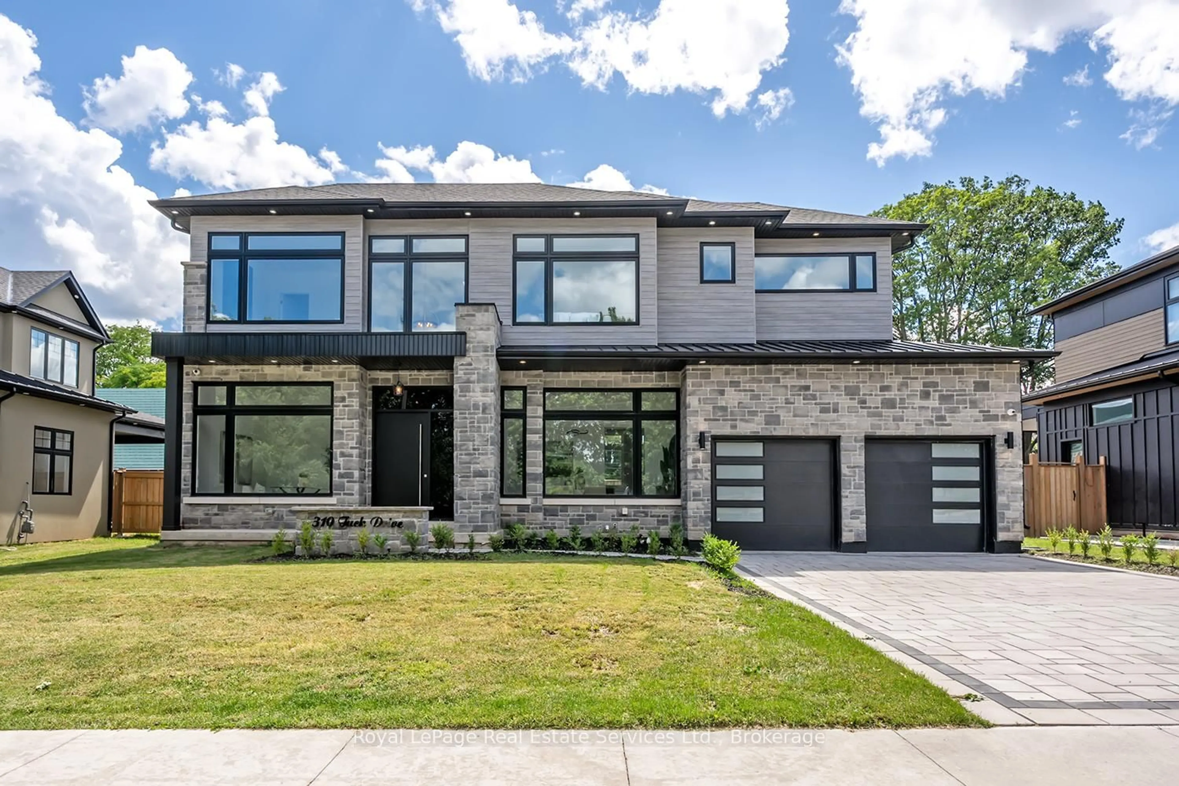 Home with brick exterior material, street for 310 Tuck Dr, Burlington Ontario L7L 2R1