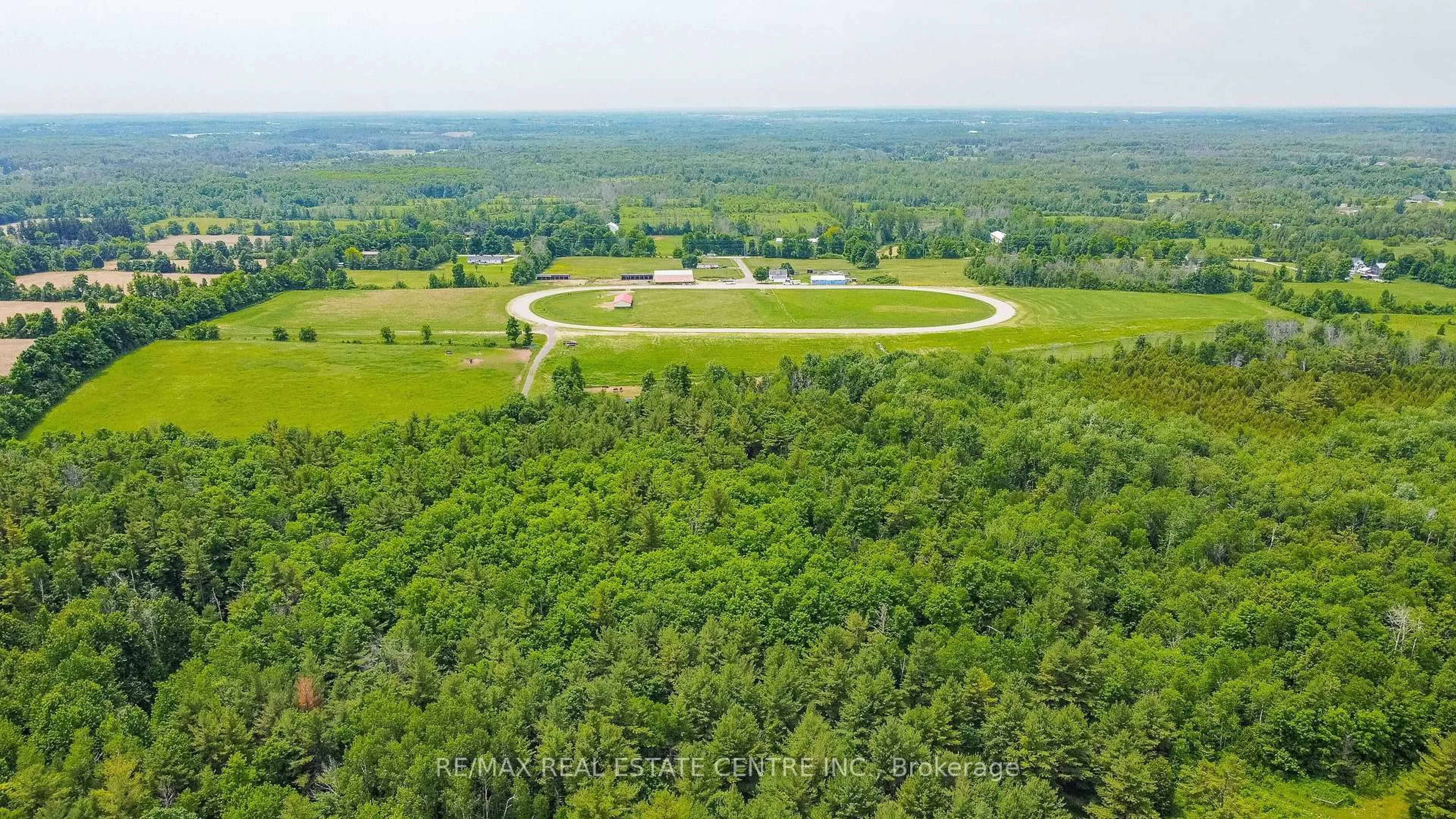 A pic from outside/outdoor area/front of a property/back of a property/a pic from drone, forest/trees view for 10253 2nd Line, Milton Ontario L0P 1B0