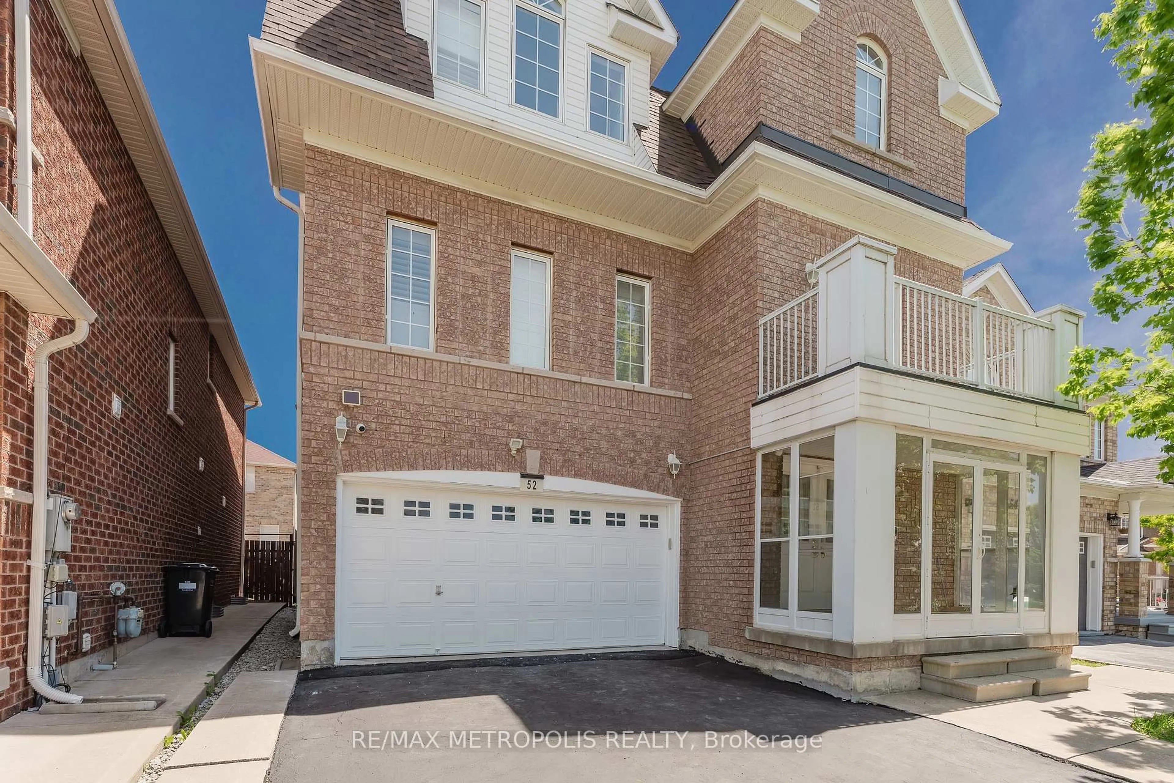 Home with brick exterior material, street for 52 Gore Valley Tr, Brampton Ontario L6P 2G9
