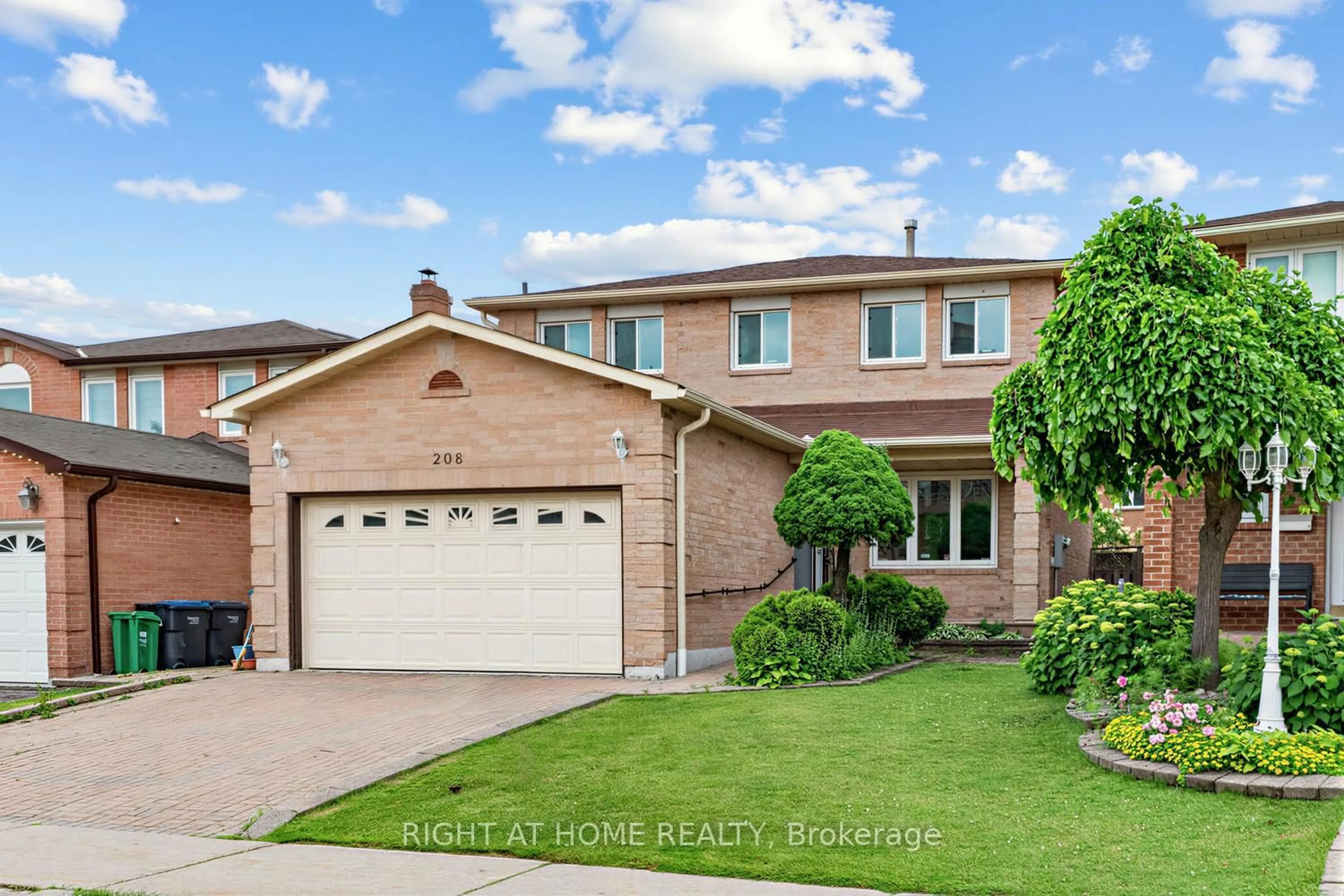 Home with brick exterior material, street for 208 Kingsbridge Garden Circ, Mississauga Ontario L5R 1L5