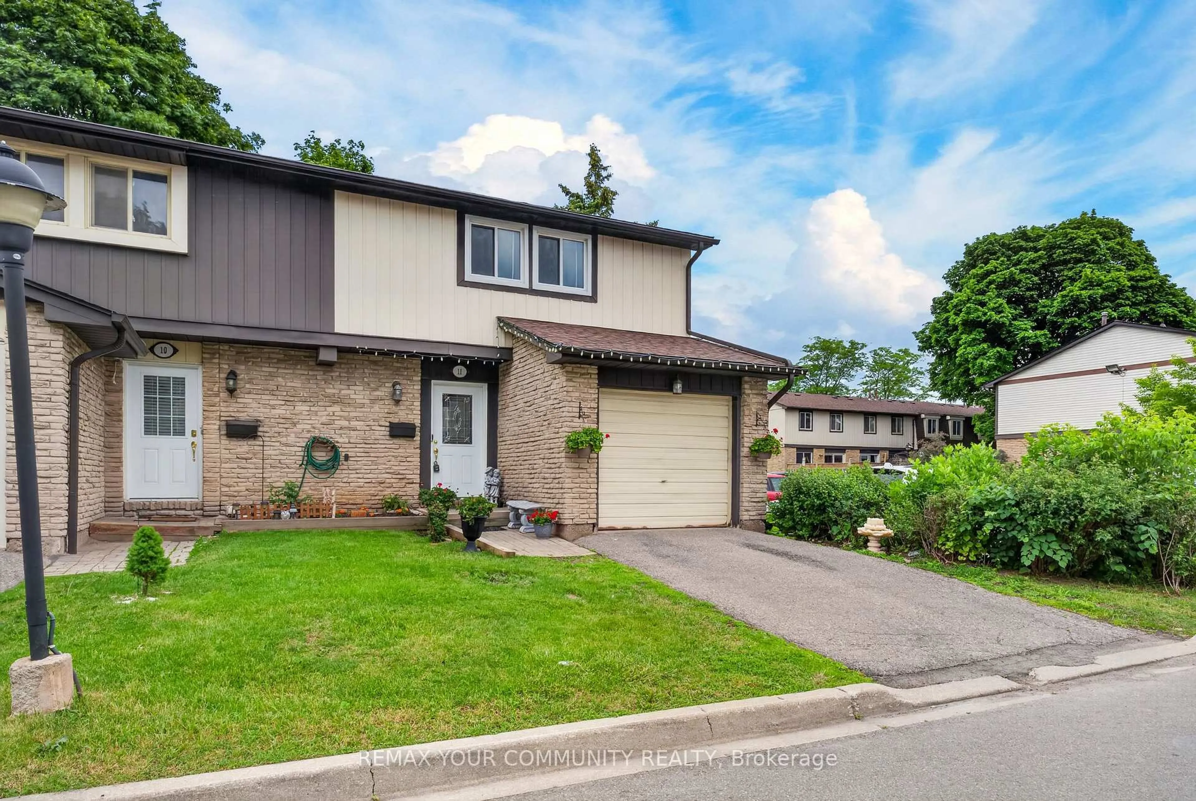 Home with brick exterior material, street for 93 Hansen Rd #11, Brampton Ontario L6V 3C8