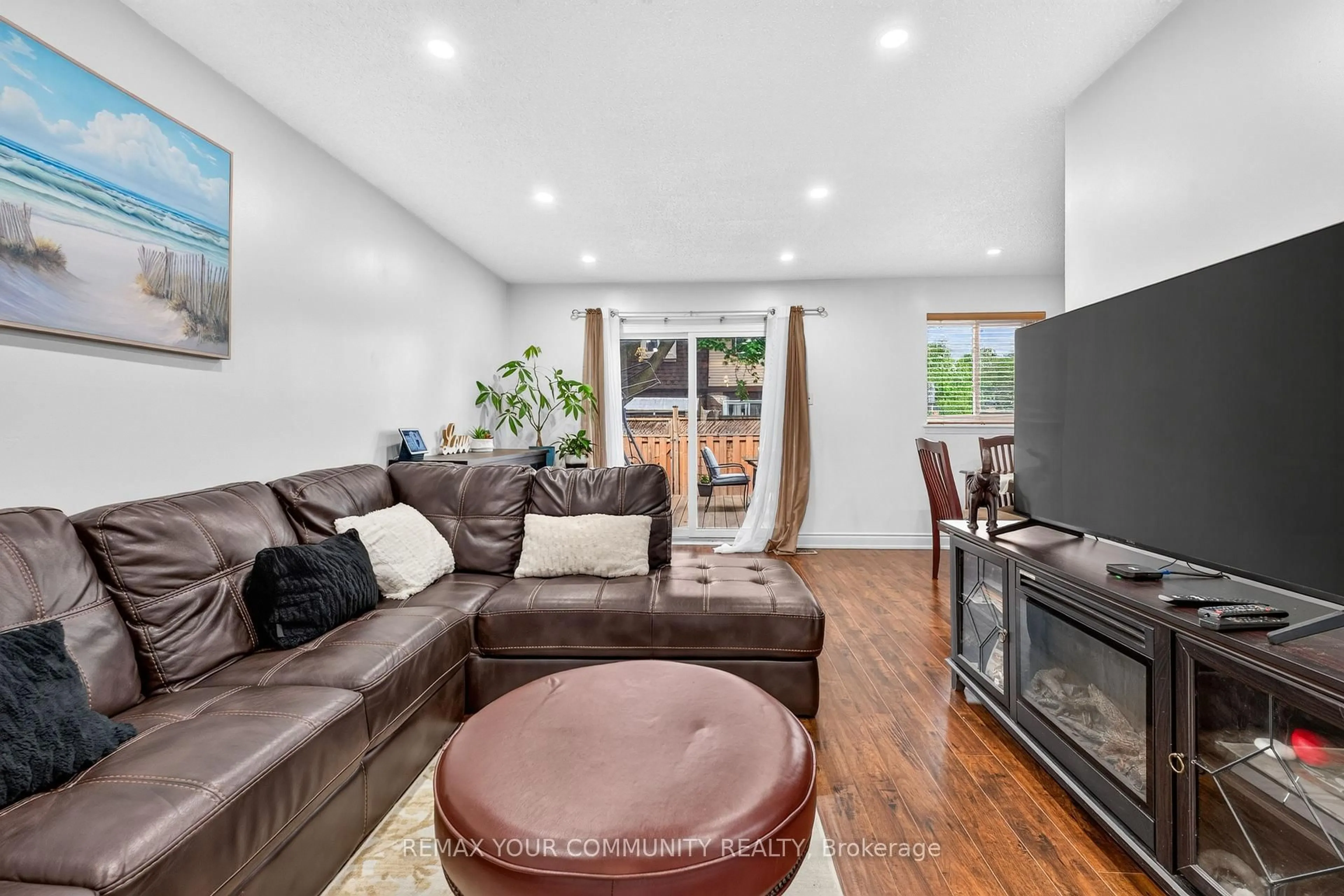 Living room with furniture, unknown for 93 Hansen Rd #11, Brampton Ontario L6V 3C8
