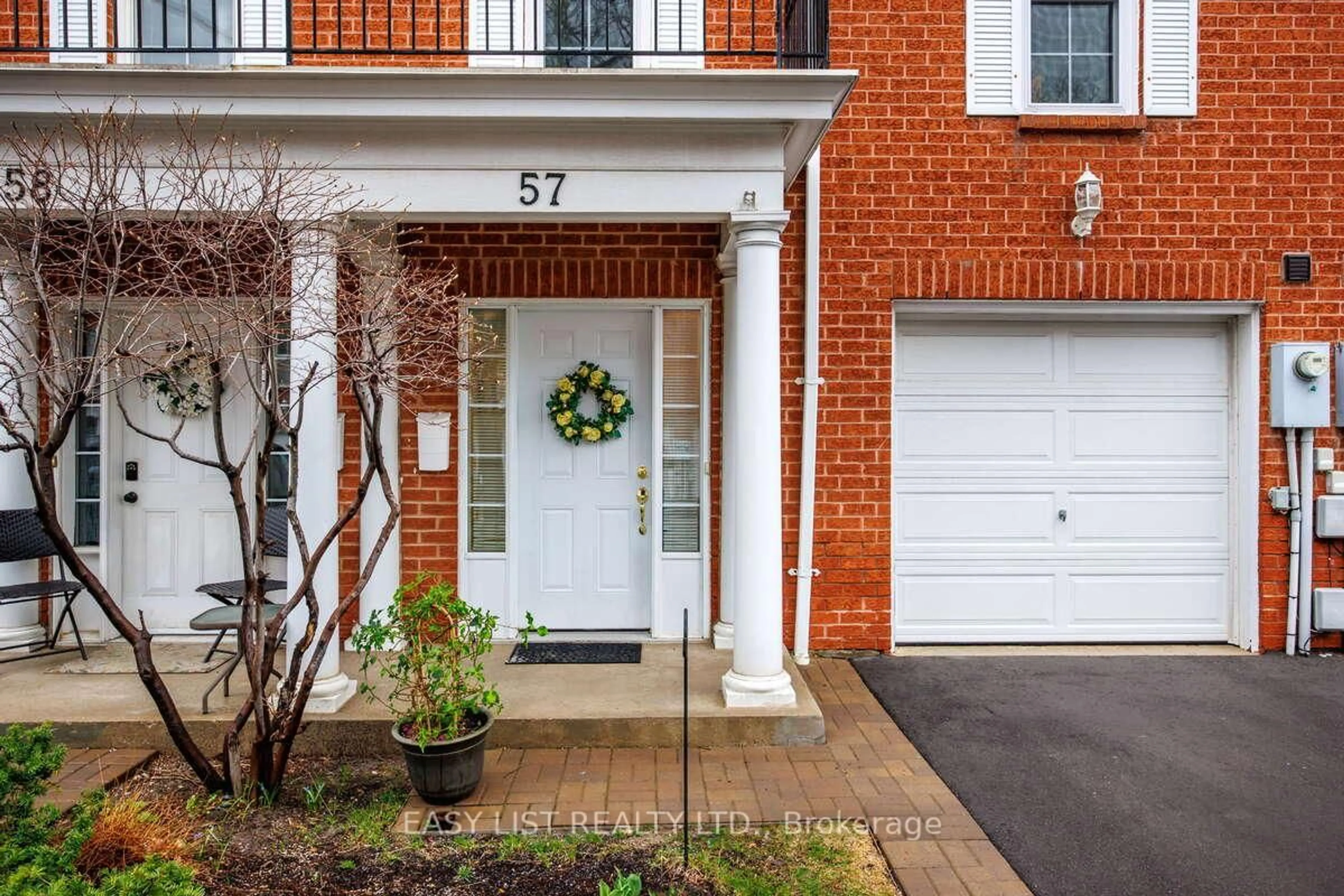 Home with brick exterior material, street for 57 Stornwood Crt, Brampton Ontario L6W 4J1