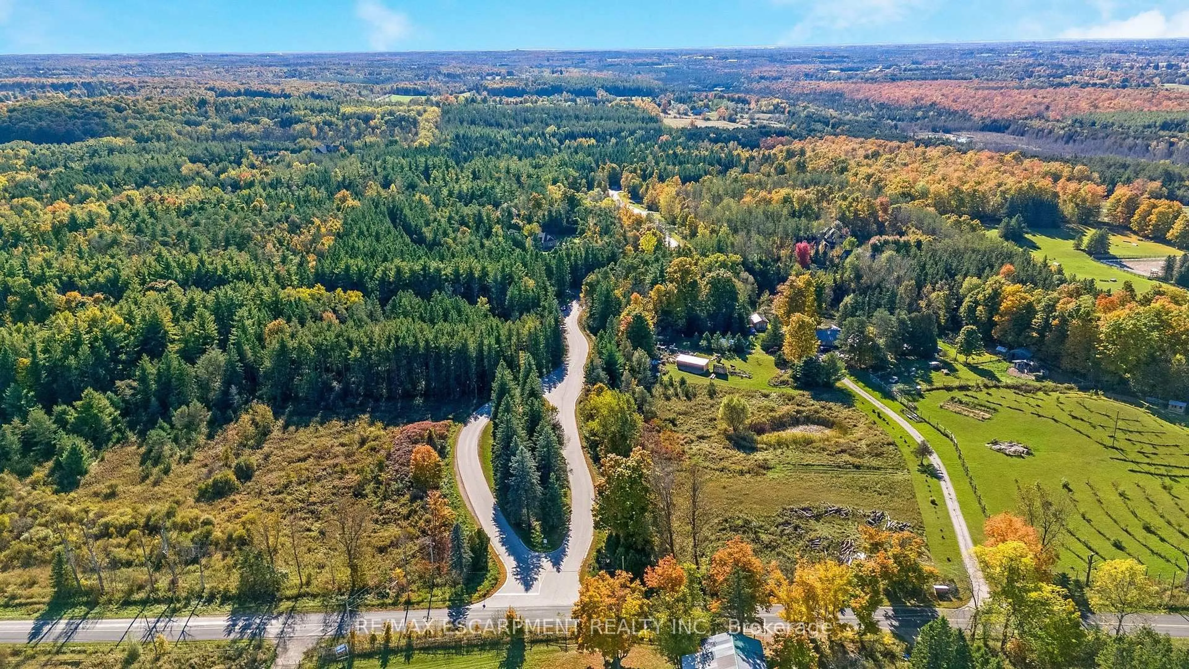 A pic from outside/outdoor area/front of a property/back of a property/a pic from drone, forest/trees view for 4320 Random Acres Rd, Milton Ontario N0B 2K0