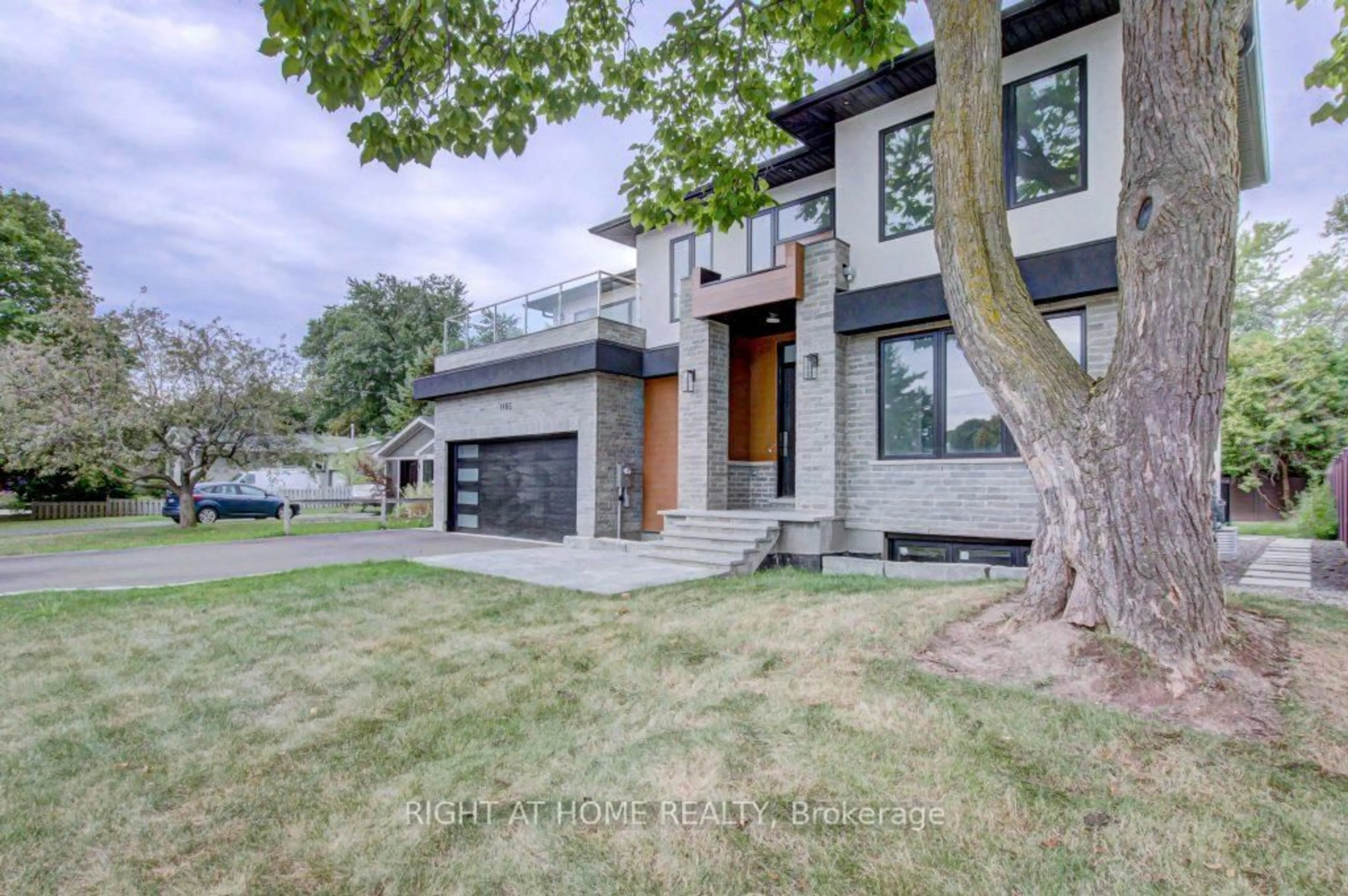 Home with brick exterior material, street for 1165 Pinegrove Rd, Oakville Ontario L6L 2W3