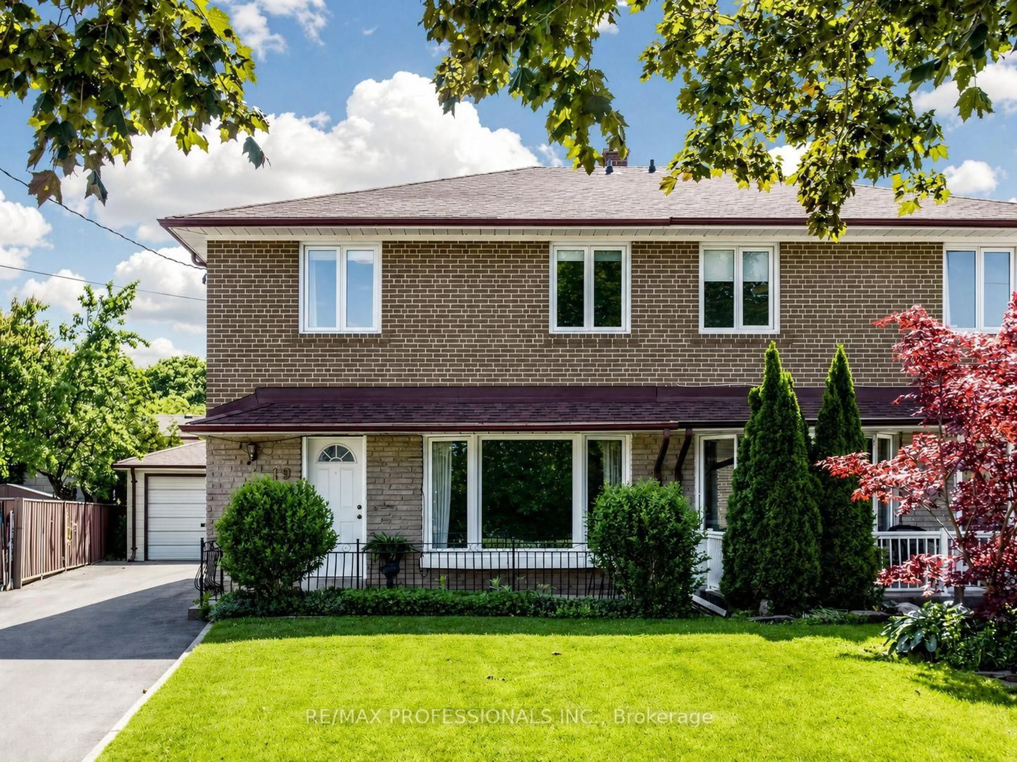 Home with brick exterior material, street for 19 Davelayne Rd, Toronto Ontario M9M 2A6