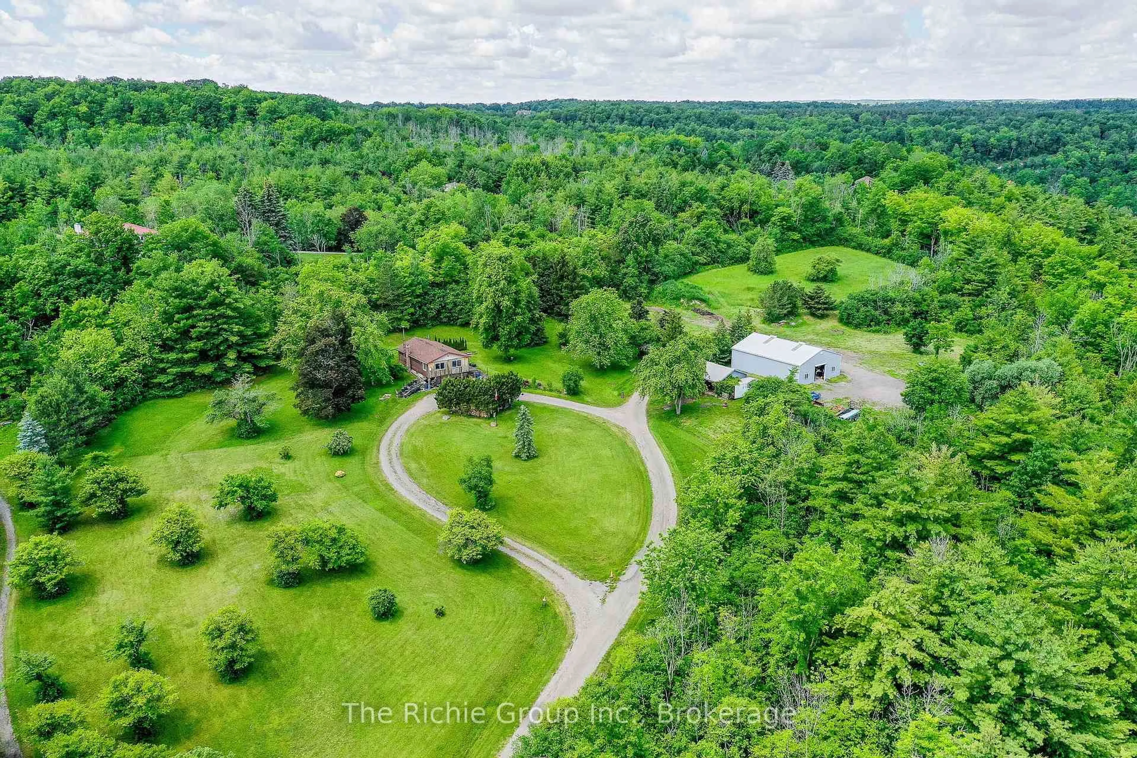 A pic from outside/outdoor area/front of a property/back of a property/a pic from drone, forest/trees view for 13494 Tenth Line, Halton Hills Ontario L7G 4S8