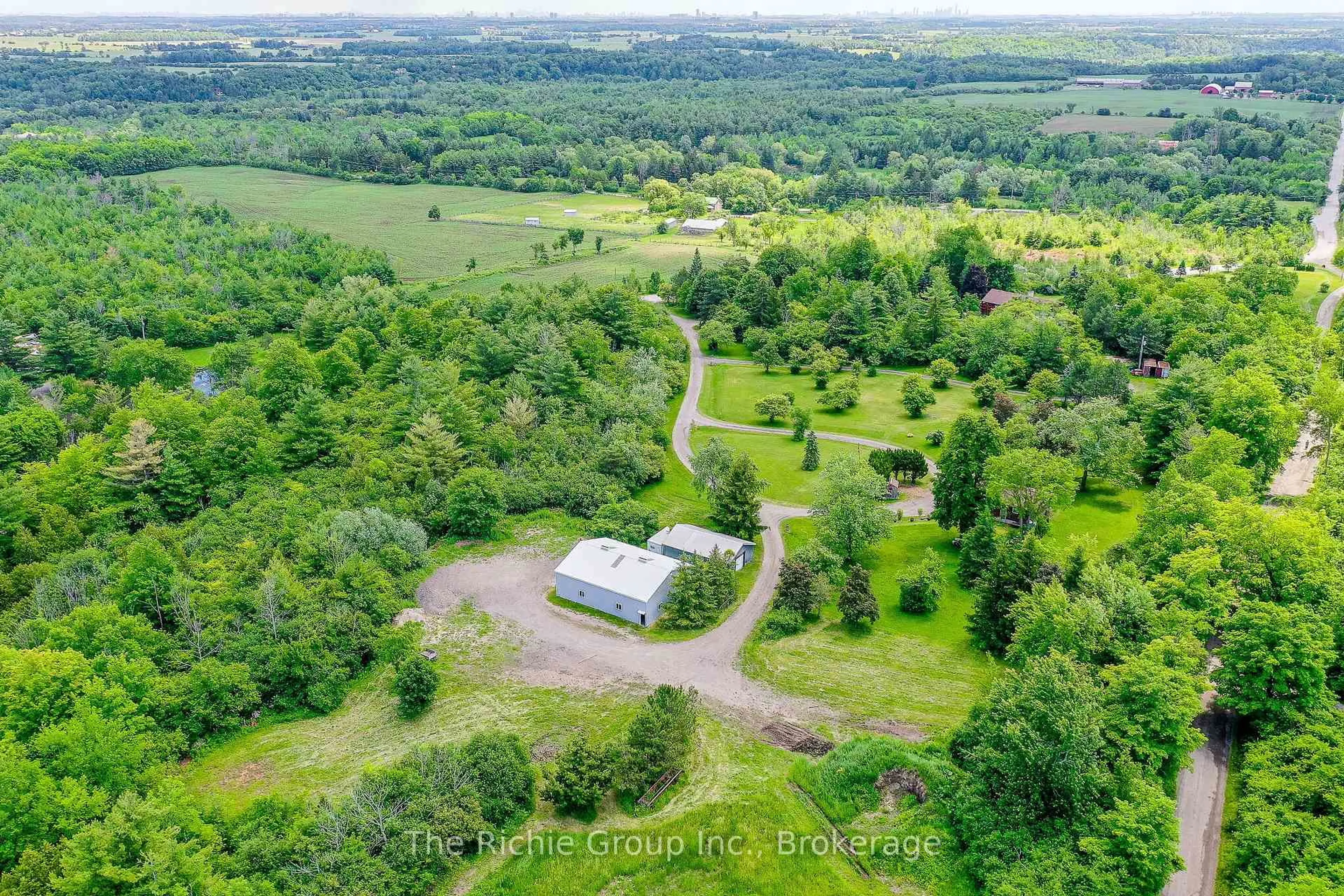 A pic from outside/outdoor area/front of a property/back of a property/a pic from drone, forest/trees view for 13494 Tenth Line, Halton Hills Ontario L7G 4S8