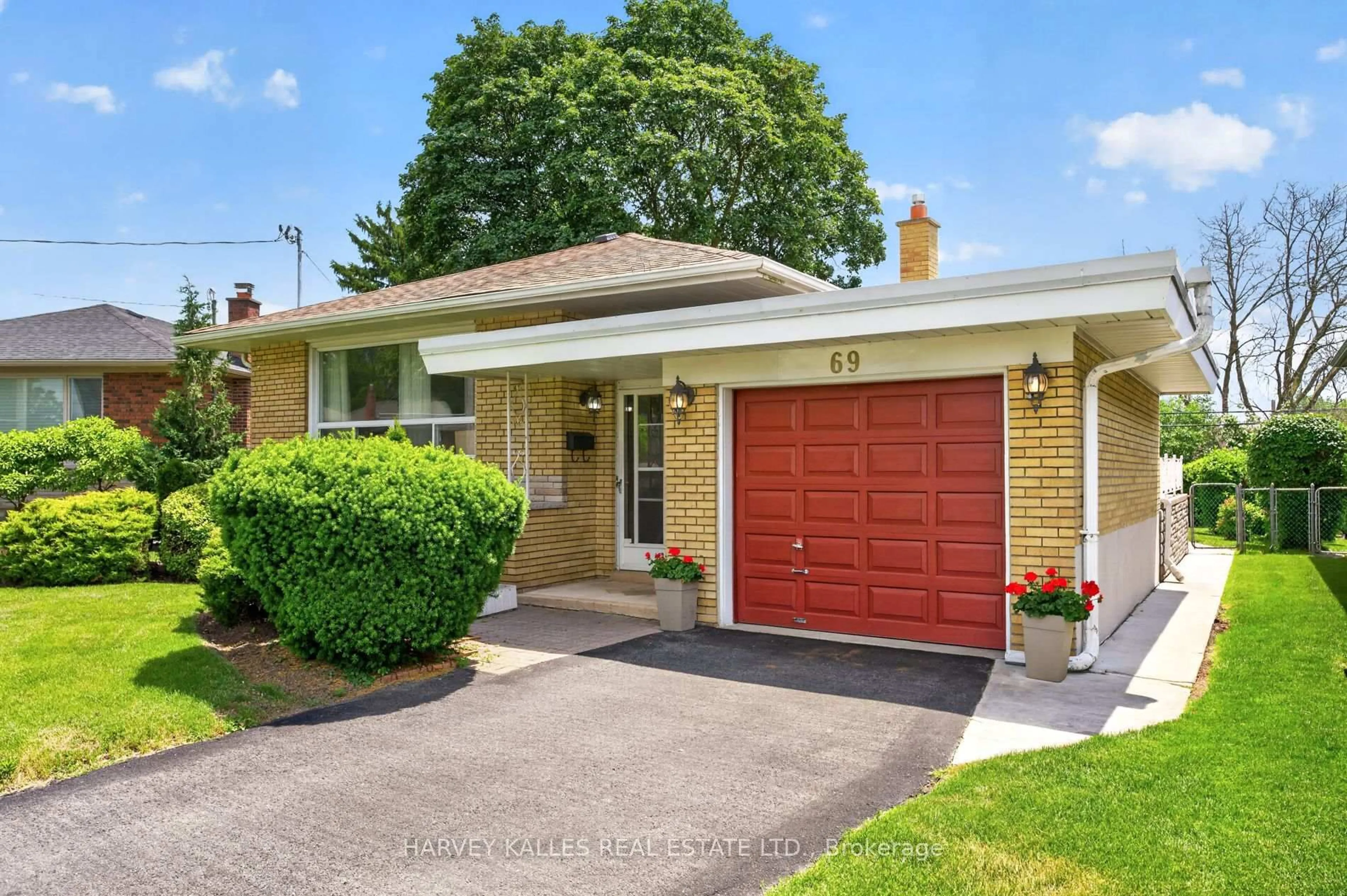 Home with brick exterior material, street for 69 Poynter Dr, Toronto Ontario M9R 1L3