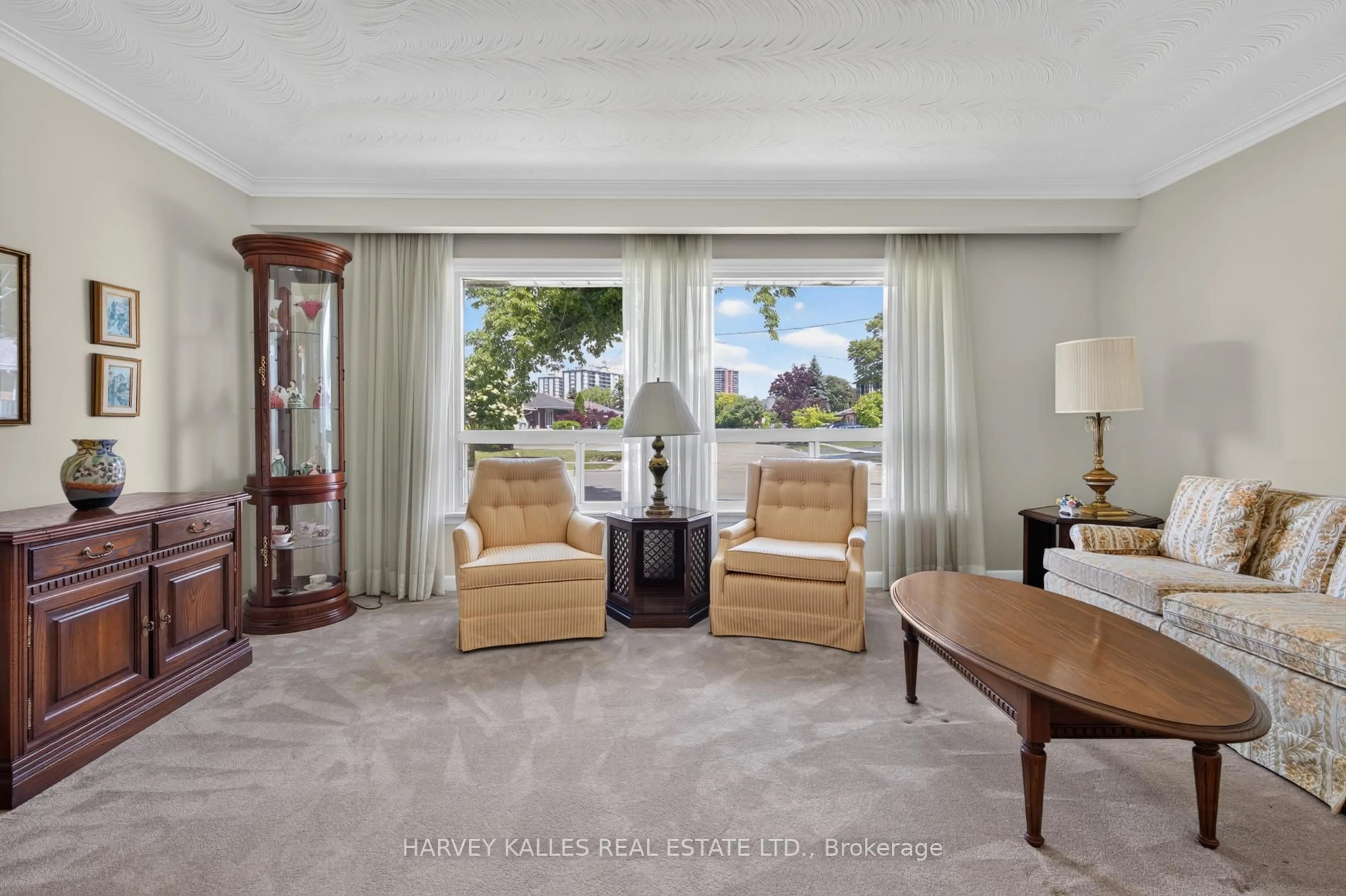 Living room with furniture, carpet floor for 69 Poynter Dr, Toronto Ontario M9R 1L3