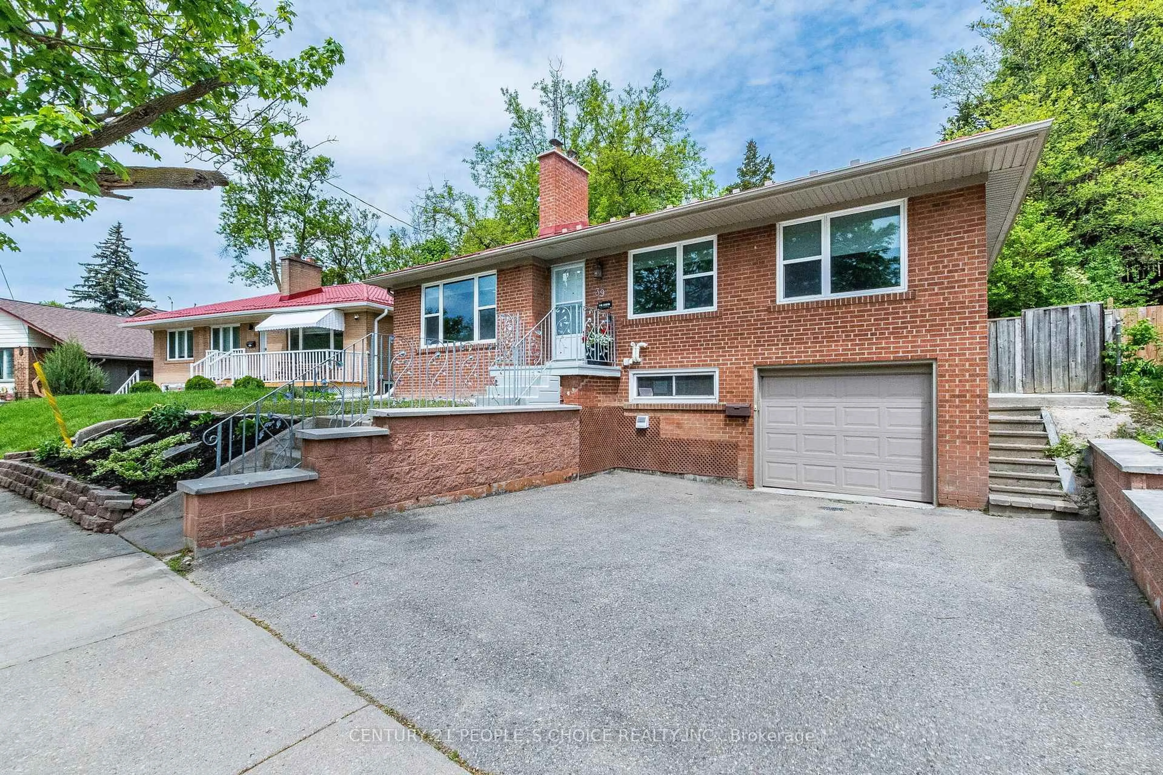 Home with brick exterior material, street for 39 Meadowland Dr, Brampton Ontario L6W 2R5