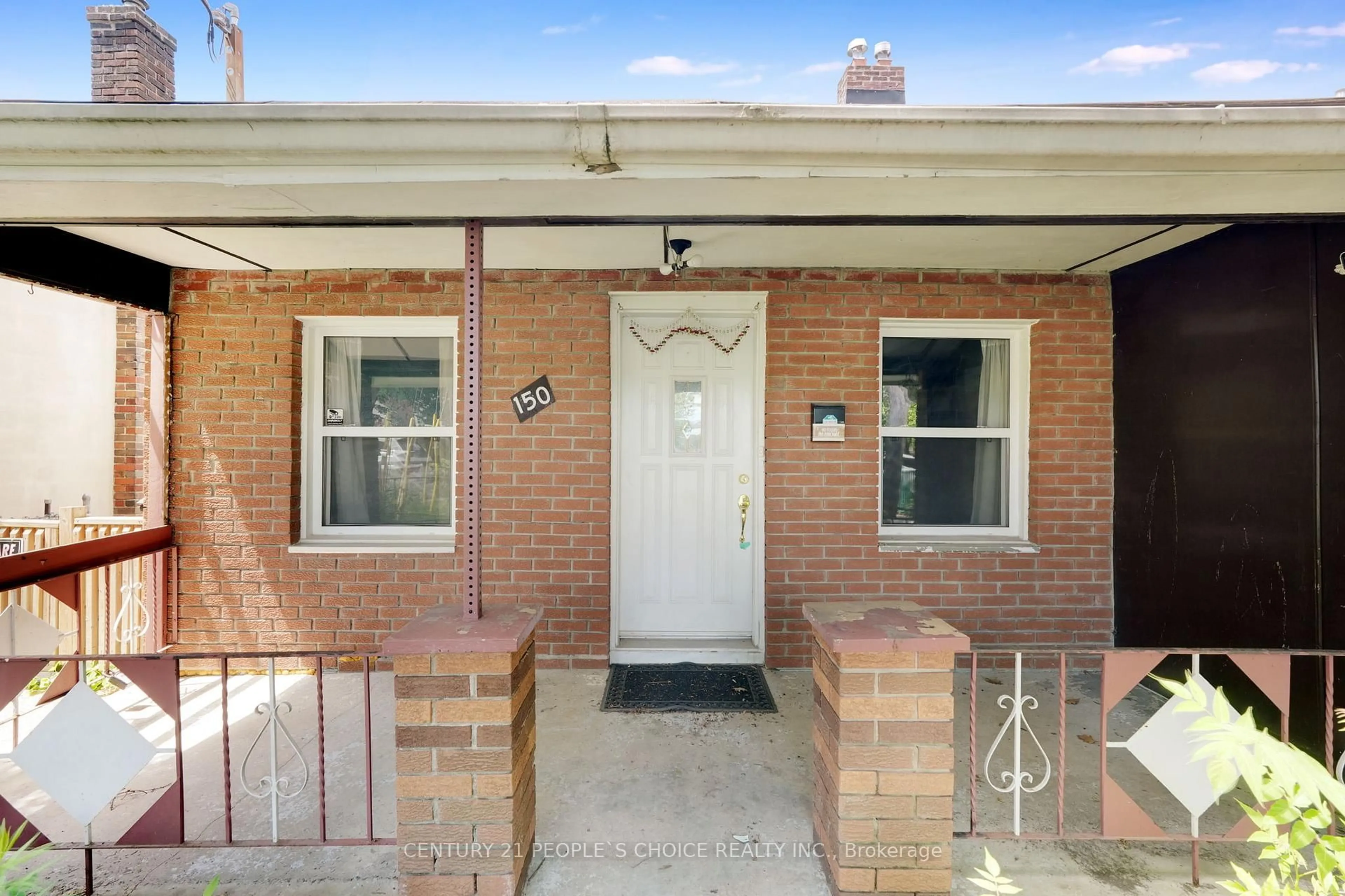 Home with brick exterior material, street for 150 Spears St, Toronto Ontario M6N 3X7