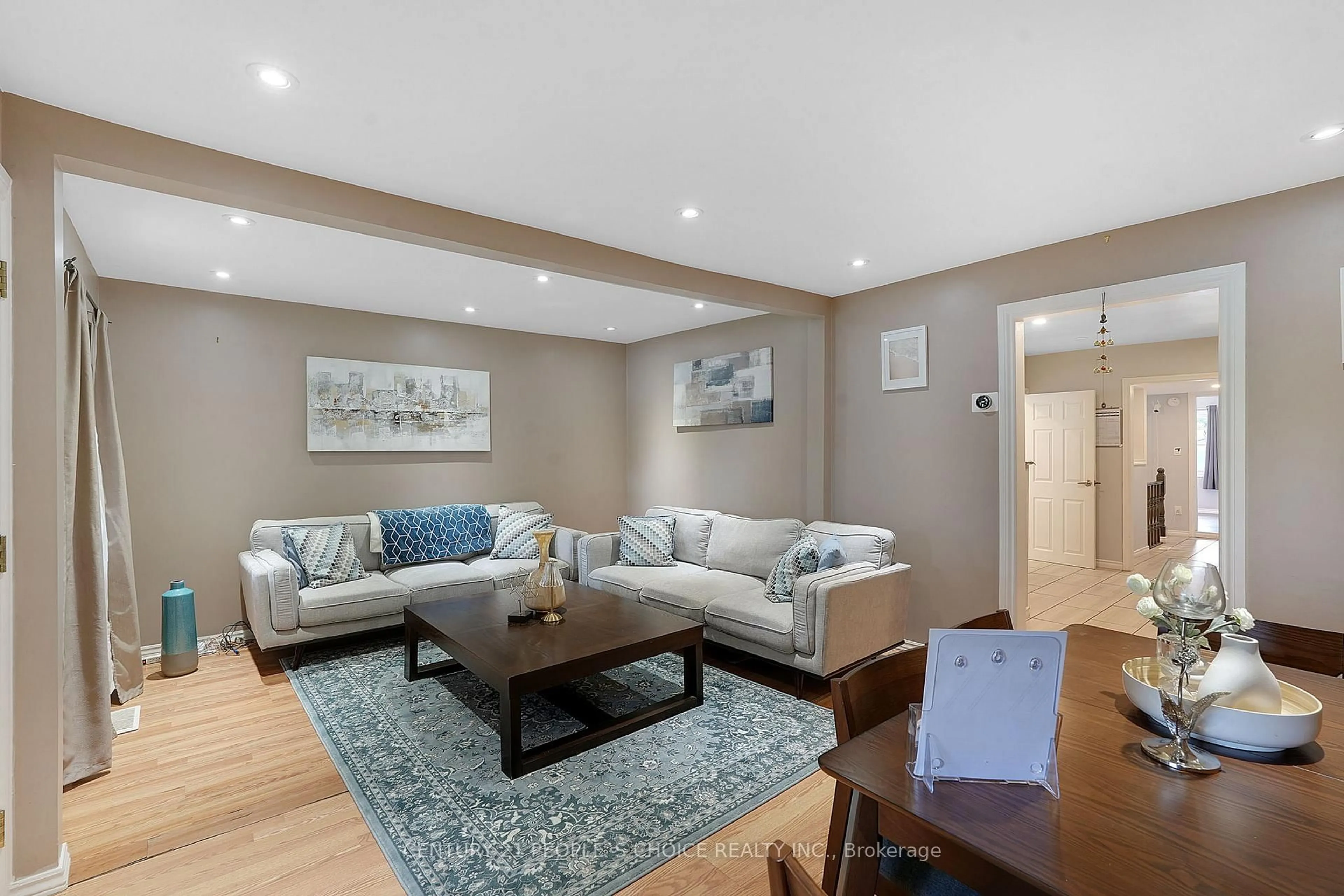 Living room with furniture, wood/laminate floor for 150 Spears St, Toronto Ontario M6N 3X7
