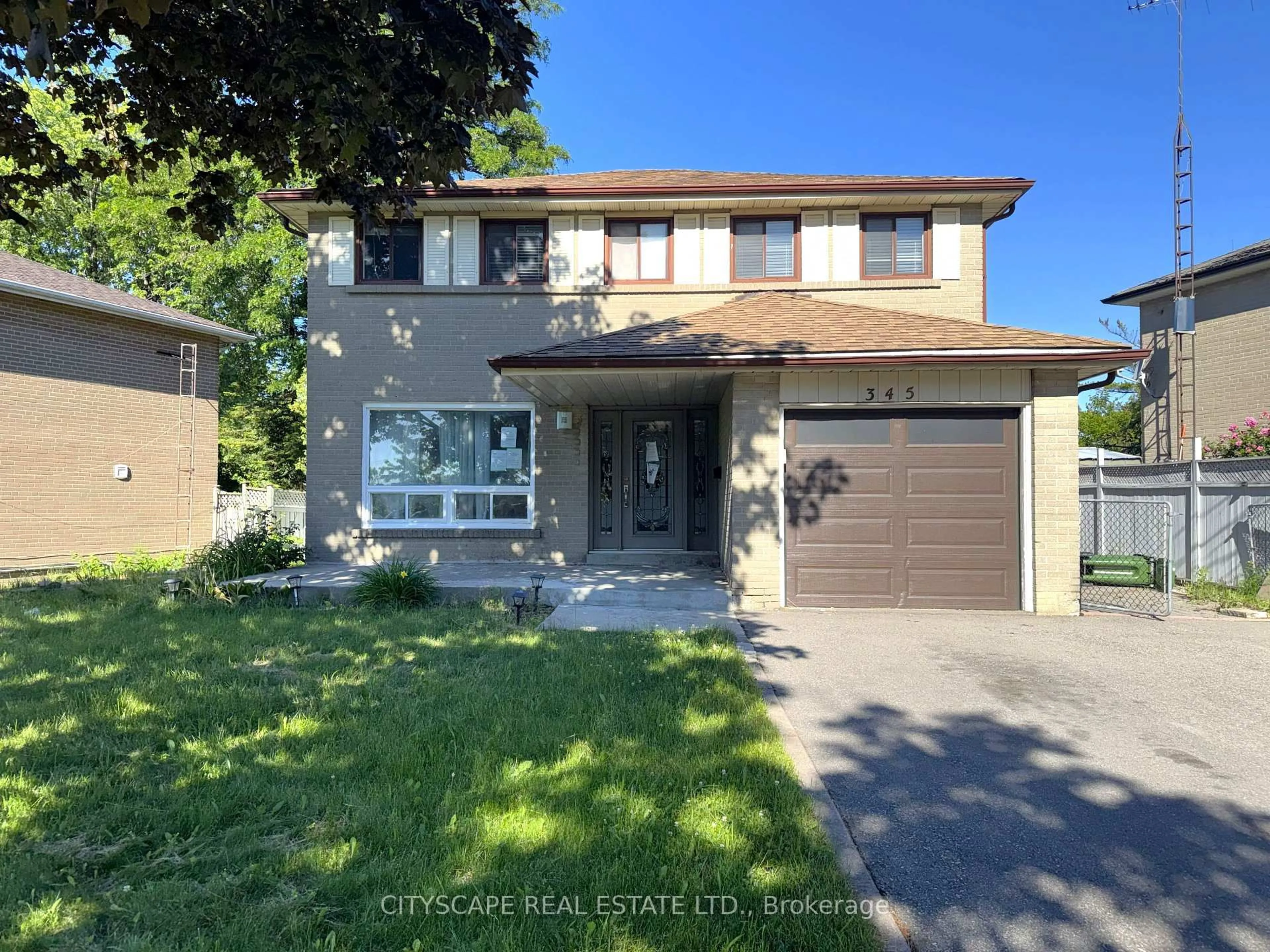 Home with brick exterior material, street for 345 Silverstone Dr, Toronto Ontario M9V 3J8