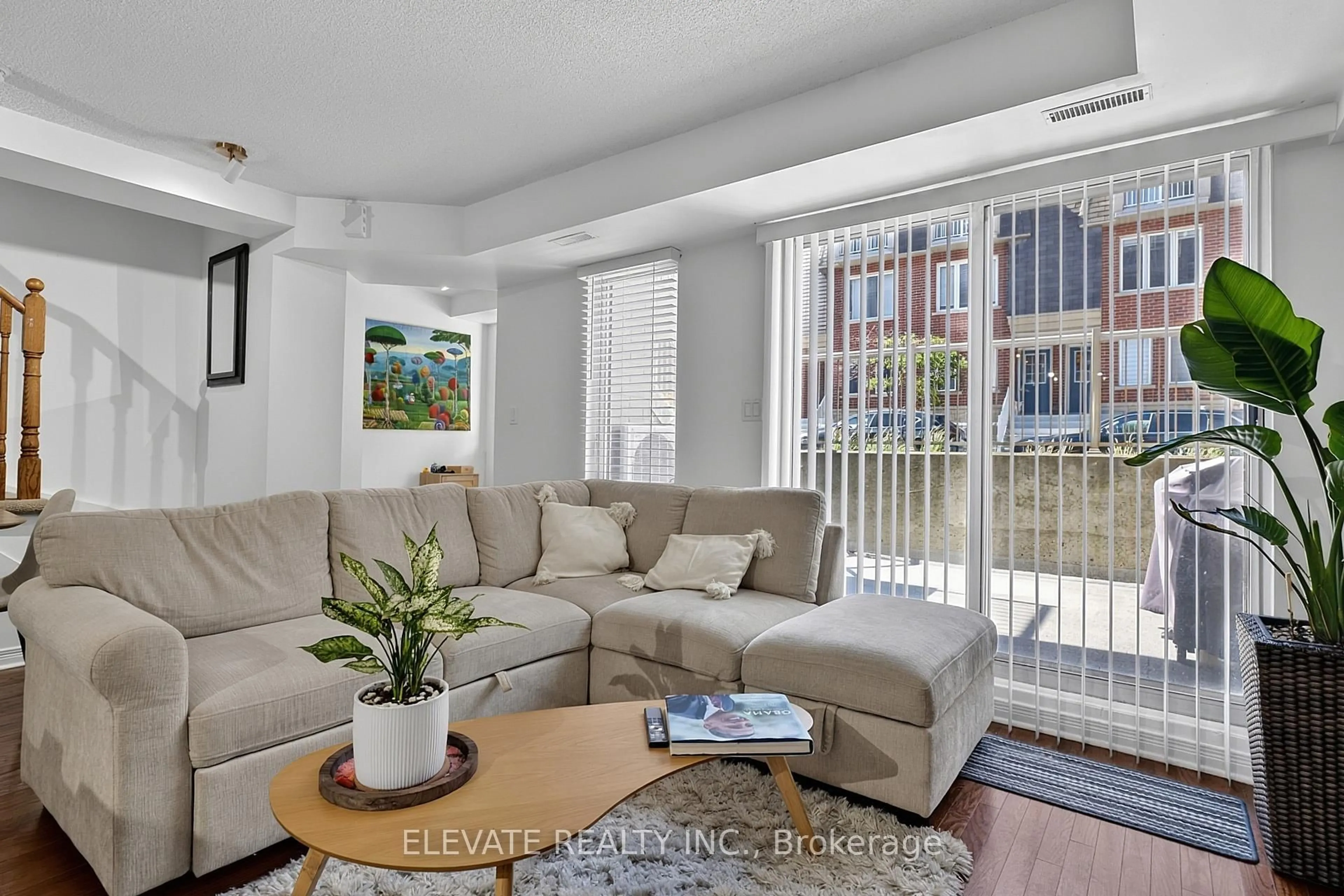 Living room with furniture, unknown for 25 Turntable Cres #141, Toronto Ontario M6H 4L1