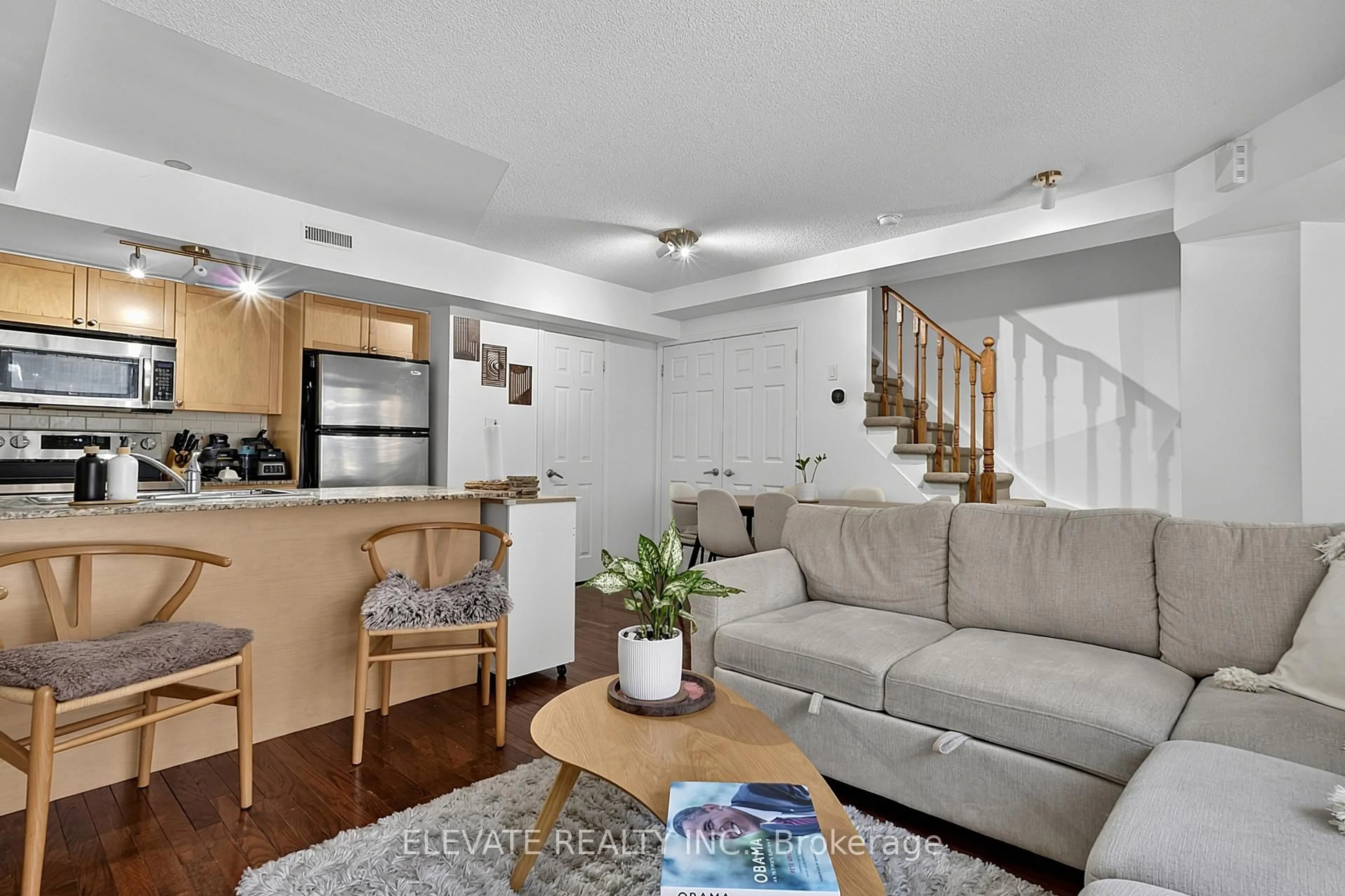 Living room with furniture, unknown for 25 Turntable Cres #141, Toronto Ontario M6H 4L1