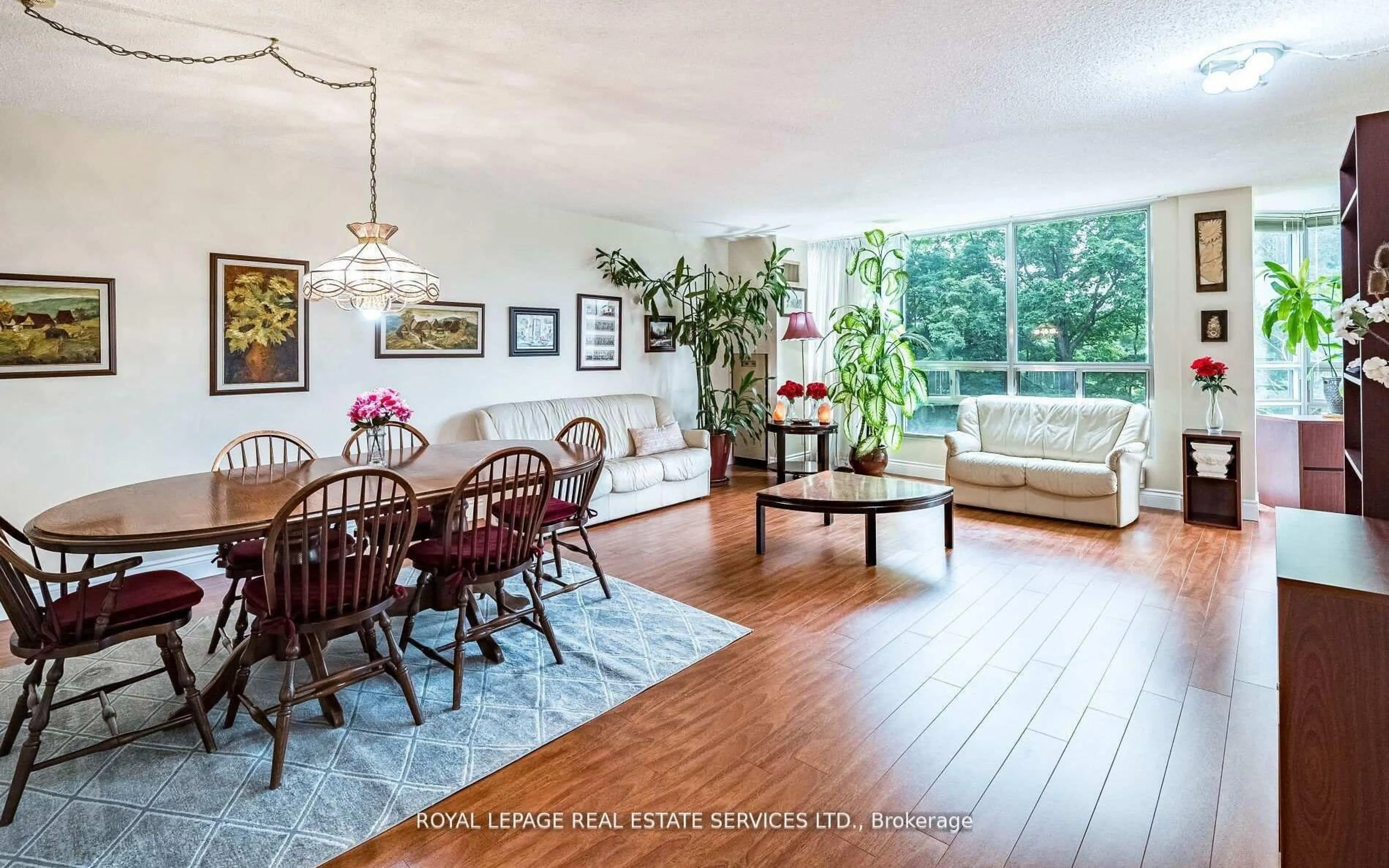 Dining room, wood/laminate floor for 310 Mill St ##202, Brampton Ontario L6Y 3B1