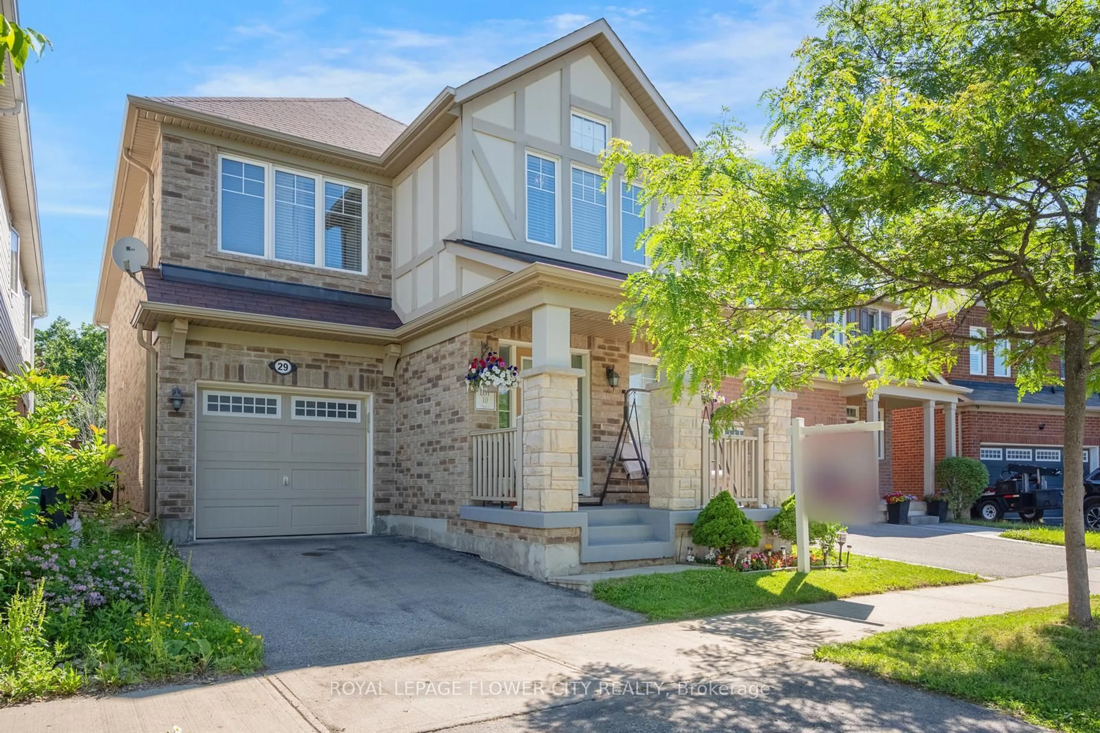 Home with brick exterior material, street for 29 Klemscott Rd, Brampton Ontario L7A 0G2
