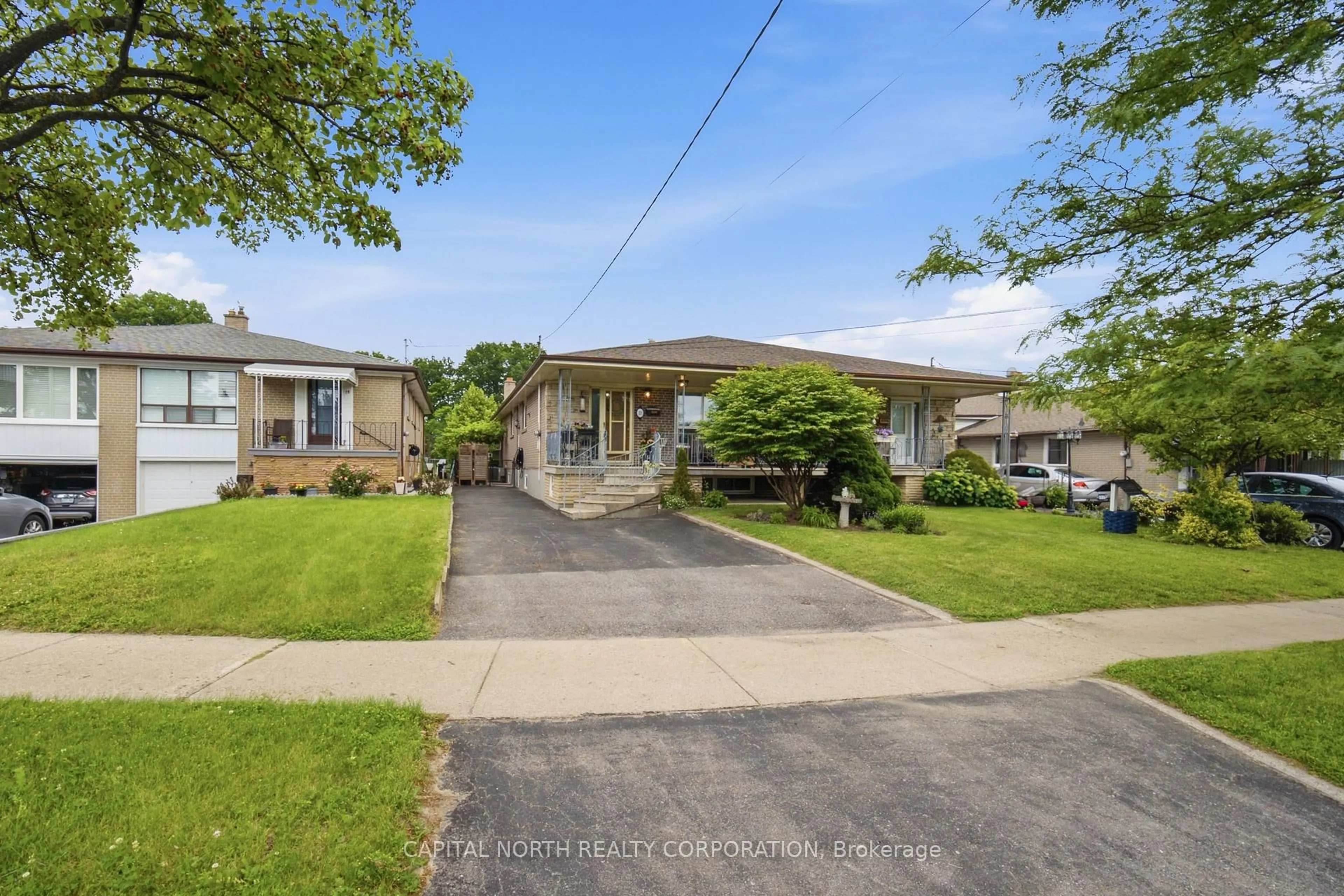 A pic from outside/outdoor area/front of a property/back of a property/a pic from drone, street for 11 Goldsboro Rd, Toronto Ontario M9L 1A6