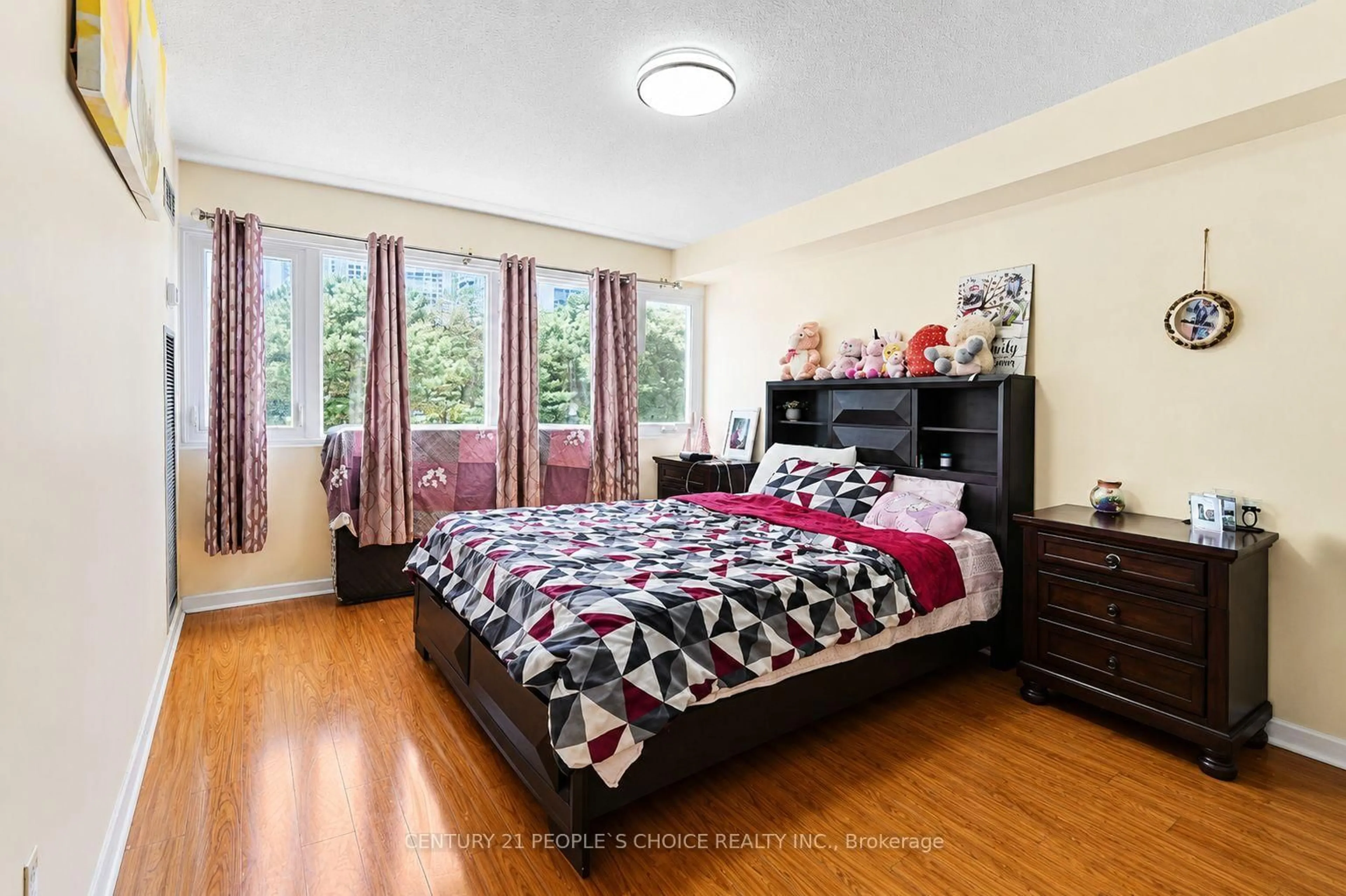 Bedroom with bed, wood/laminate floor for 1580 Mississauga Valley Blvd #207, Mississauga Ontario L5A 3T8