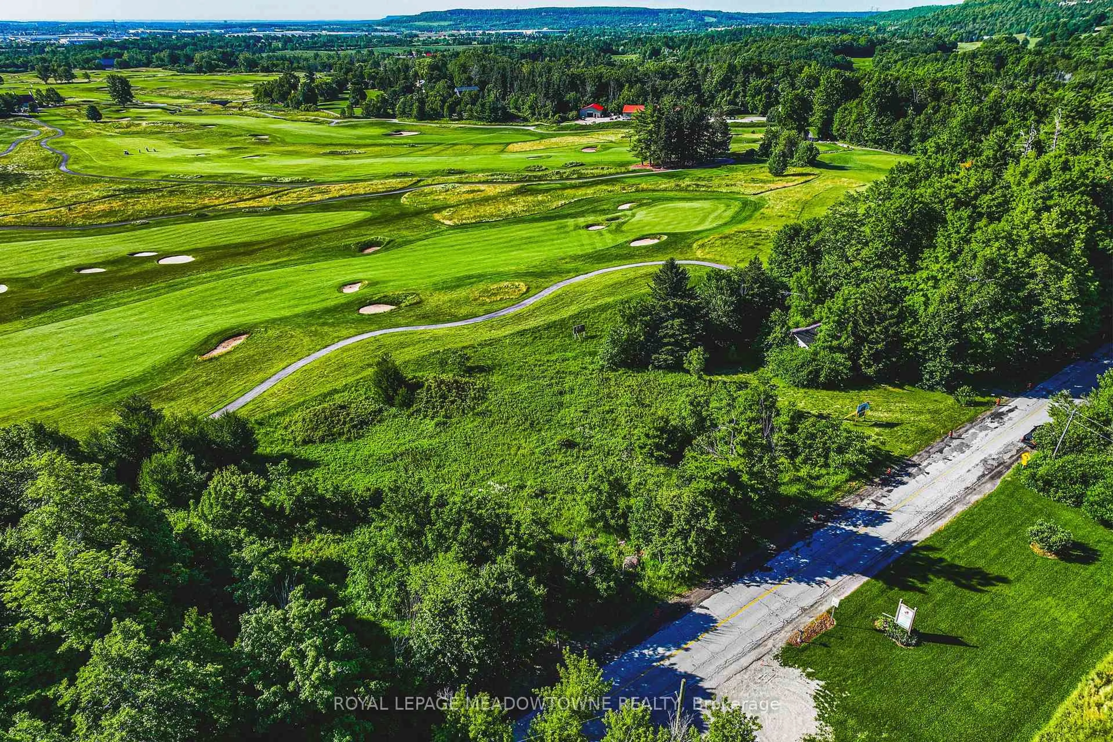 A pic from outside/outdoor area/front of a property/back of a property/a pic from drone, forest/trees view for 8220 10 Sdrd, Halton Hills Ontario L9T 2X7