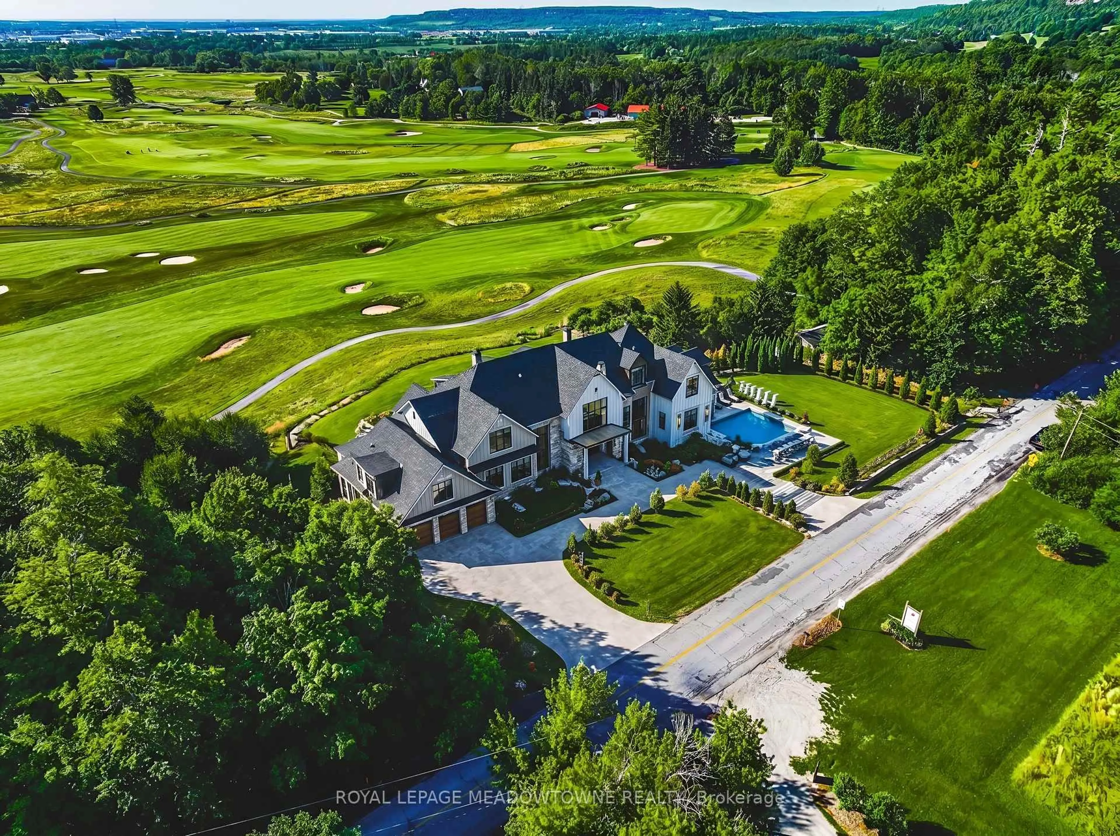 A pic from outside/outdoor area/front of a property/back of a property/a pic from drone, mountain view for 8220 10 Sdrd, Halton Hills Ontario L9T 2X7
